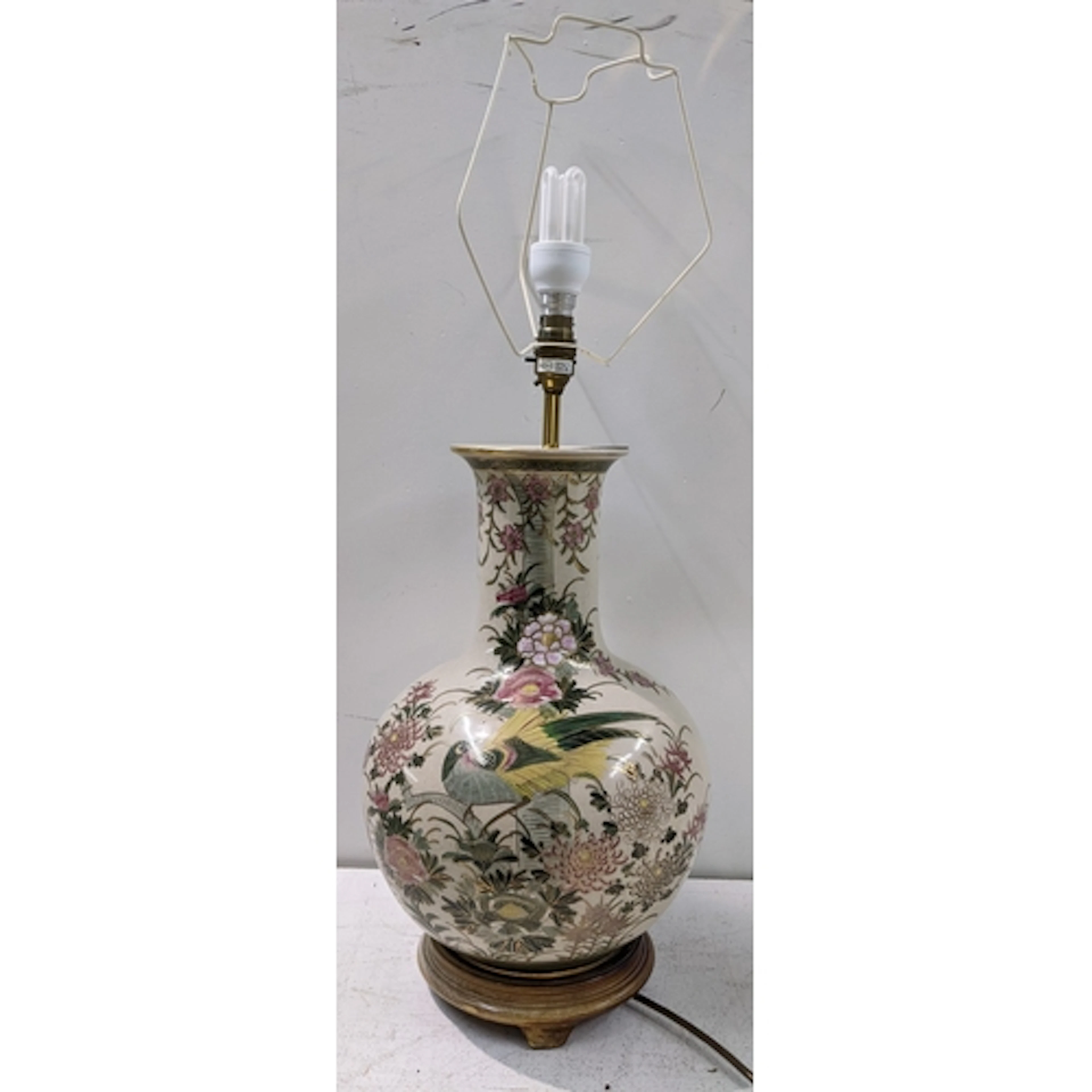 A 20th century Japanese porcelain vase/table lamp, painted w...