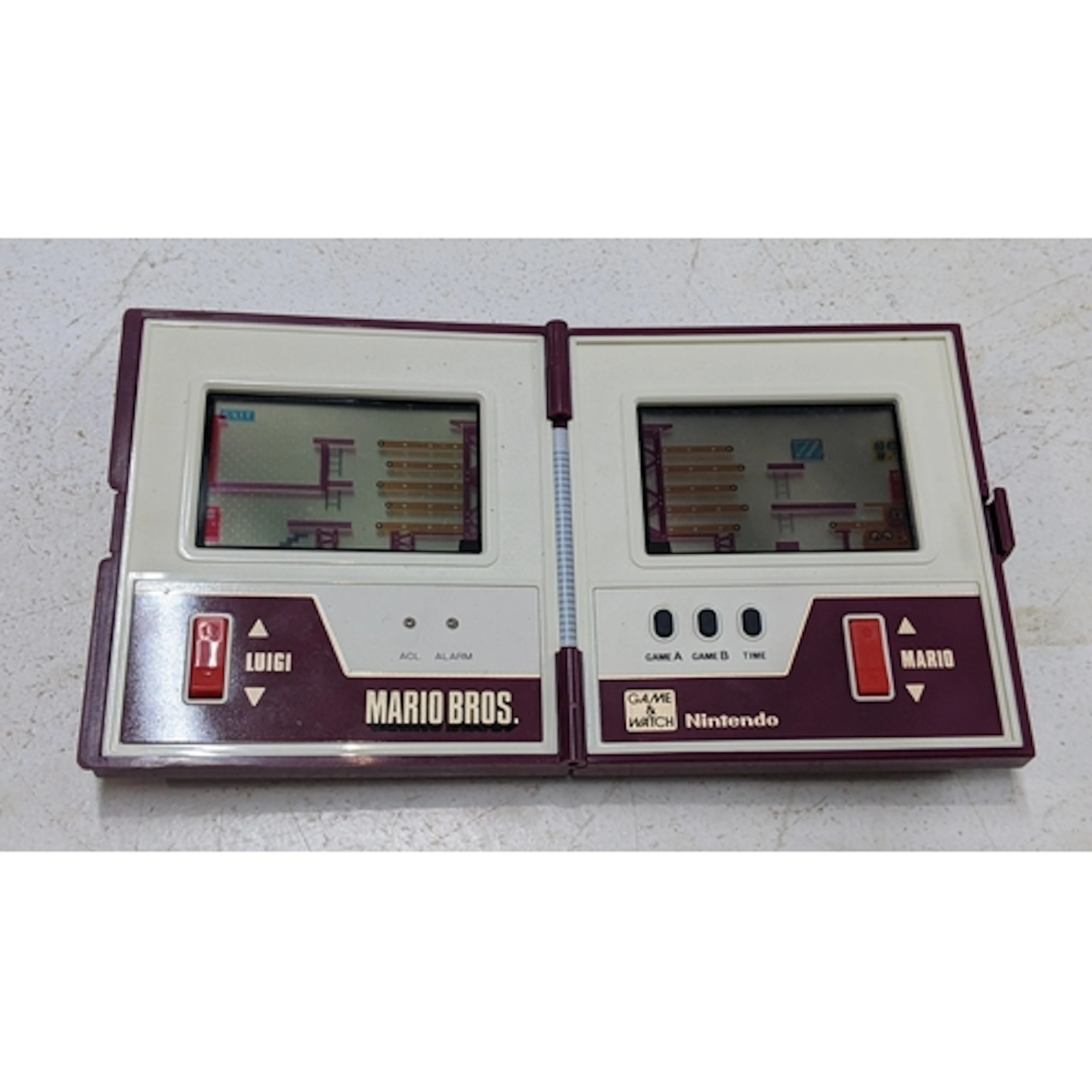 A Game & Watch Nintendo Mario Bros console Location:C8 If th...