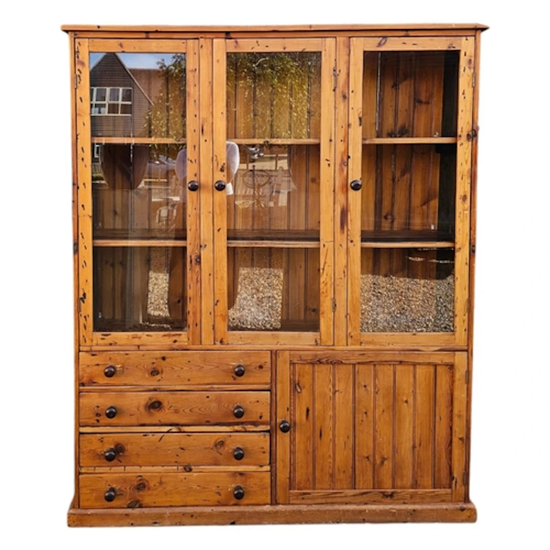 A VICTORIAN STYLE RECLAIMED PINE DRESSER With three glazed d...