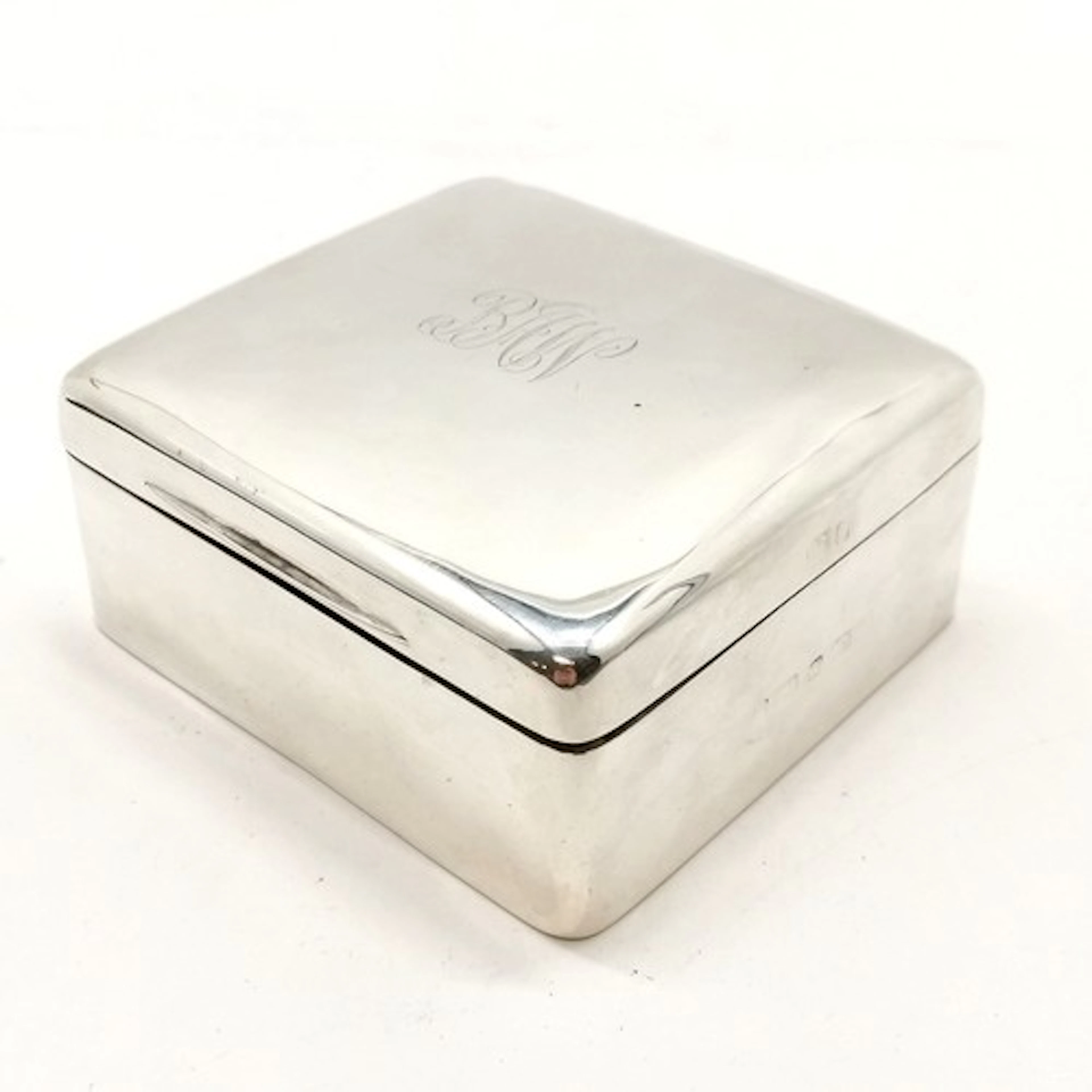 Silver hallmarked cigarette box with wooden liner and weight...
