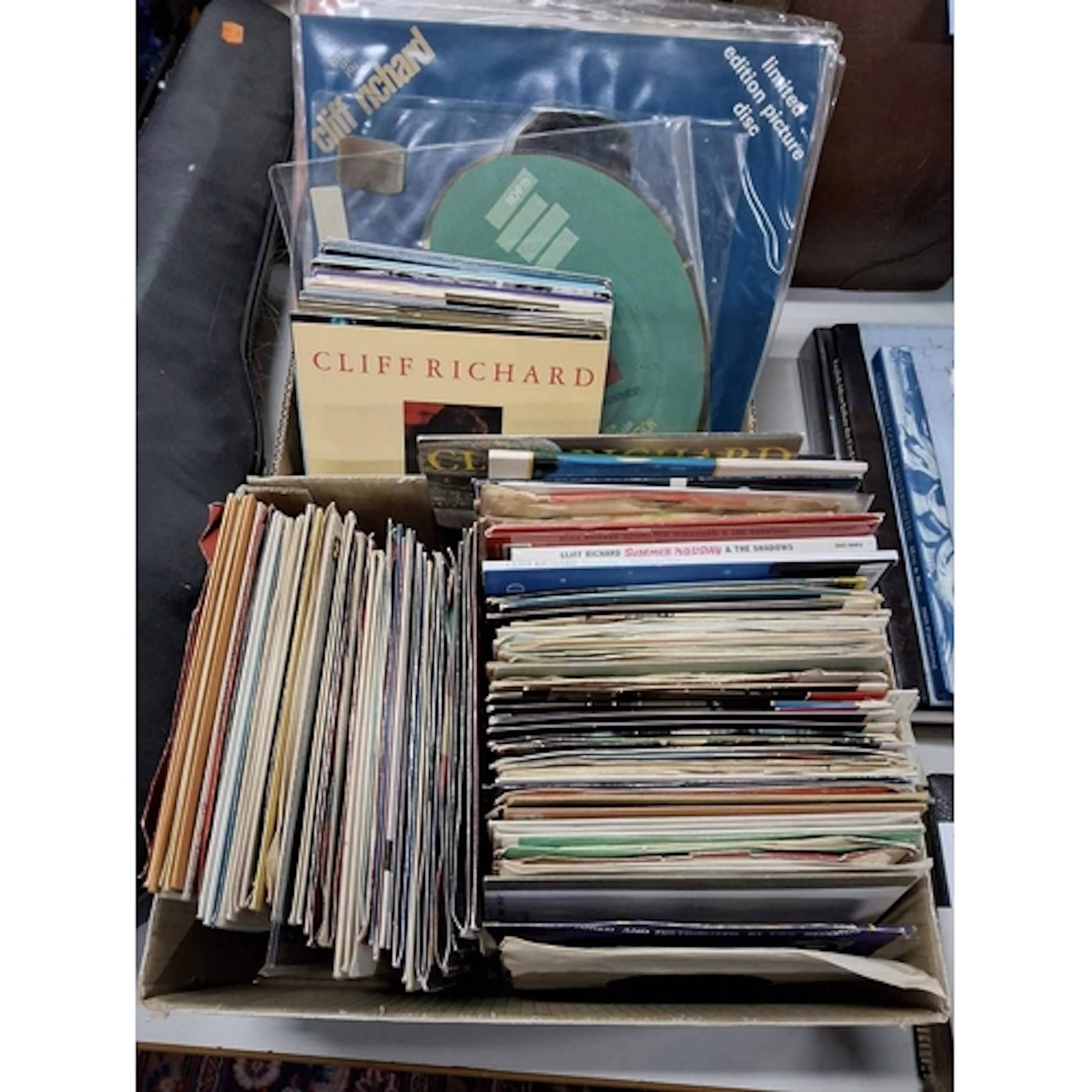 TWO BOXES OF VINYL SINGLE RECORDS AND PICTURE DISCS FT. CLIF...