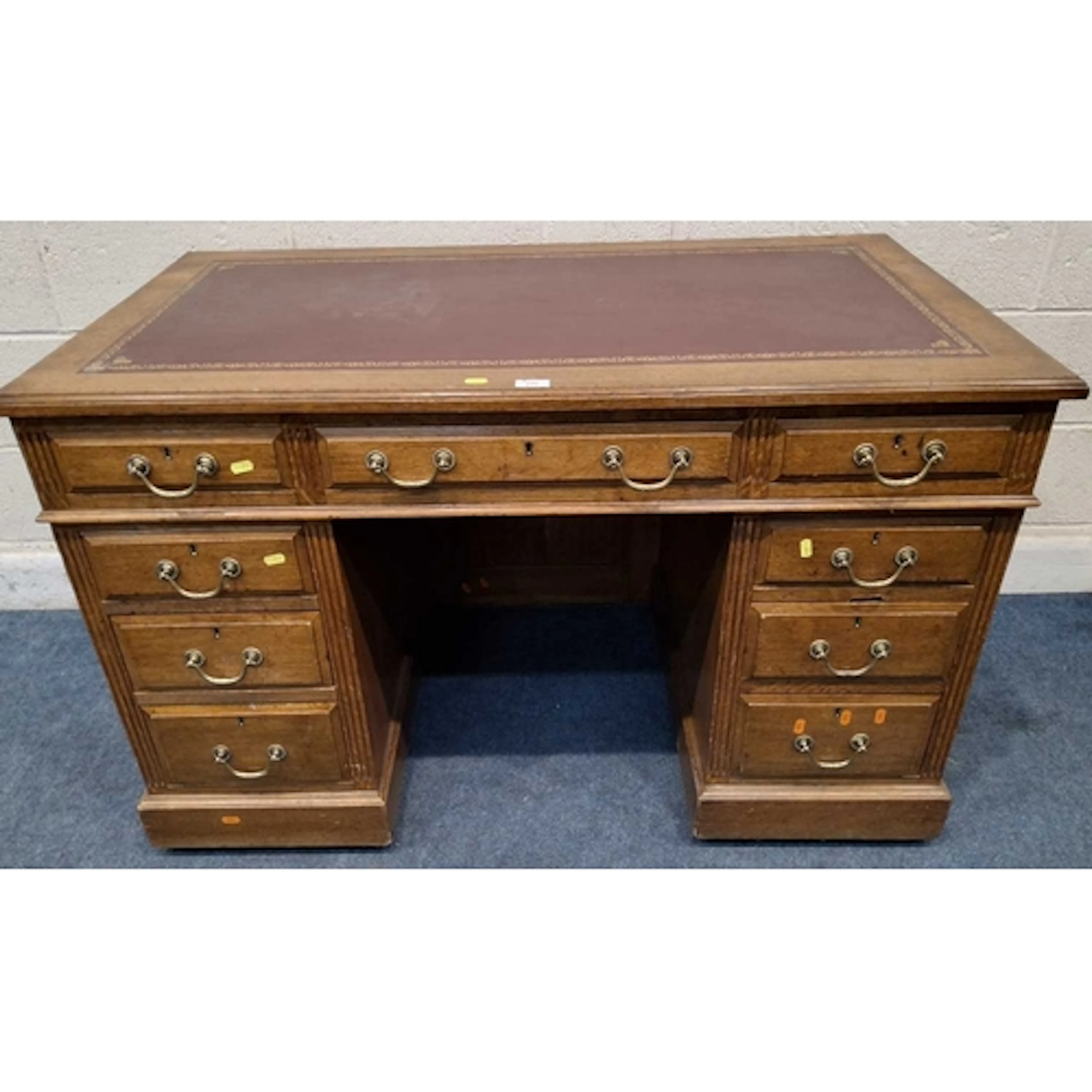 POSSIBLY MAPLE AND CO AN EARLY 20TH CENTURY OAK TWIN PEDESTA...
