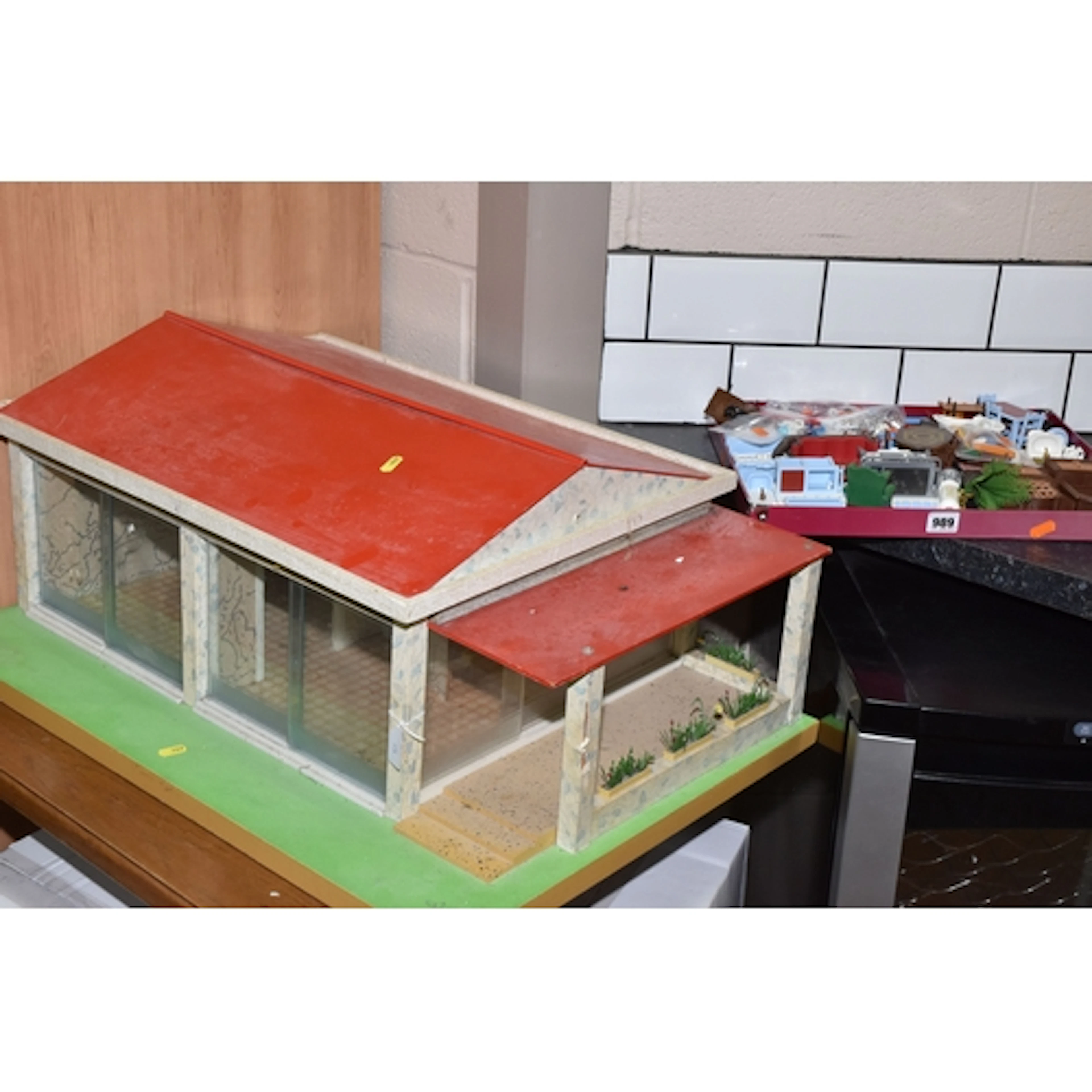 A DOLLS HOUSE AND TRAY OF PLAYMOBIL FURNITURE AND FIGURES to...