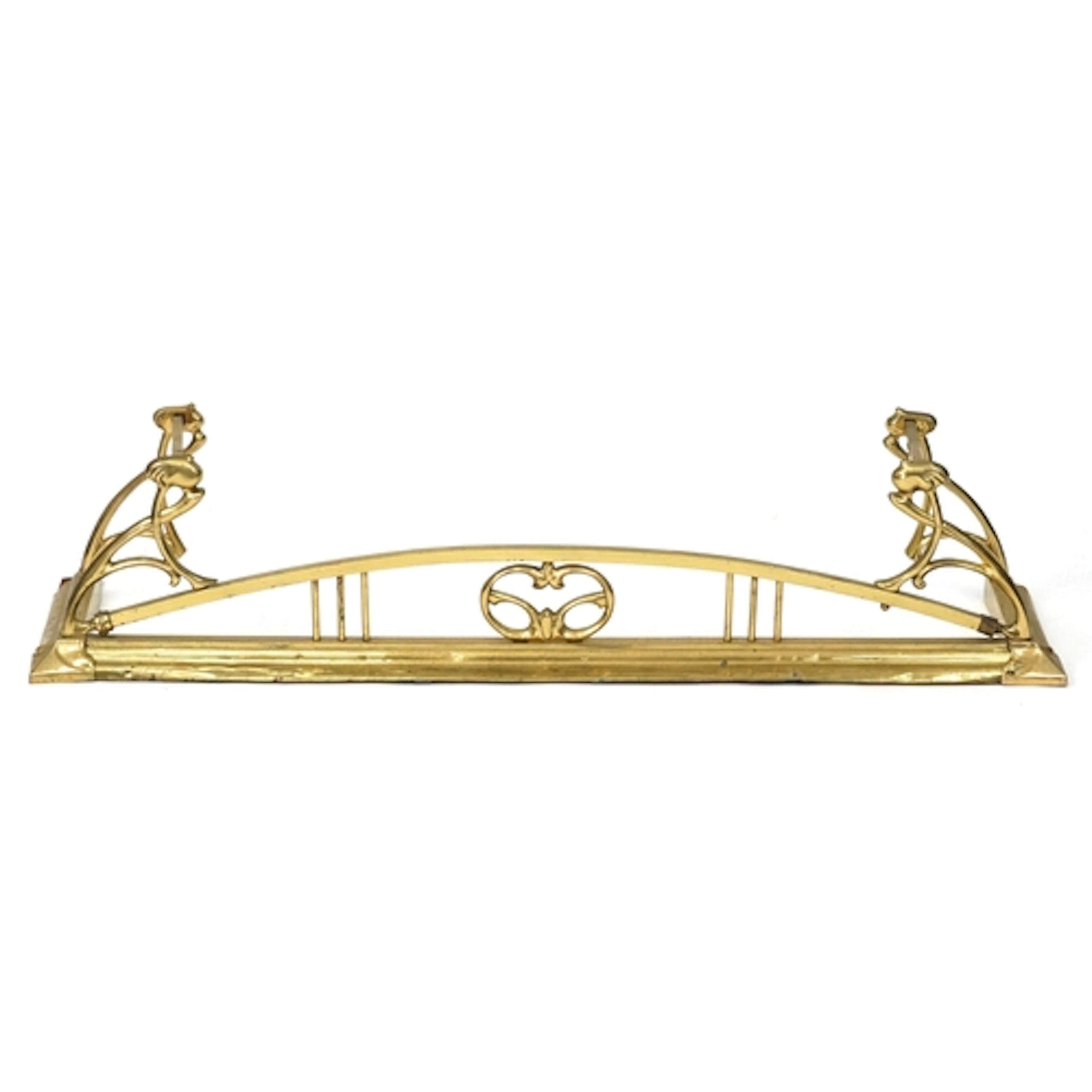 Arts & Crafts brass fender with stylized decoration, 130cm w...