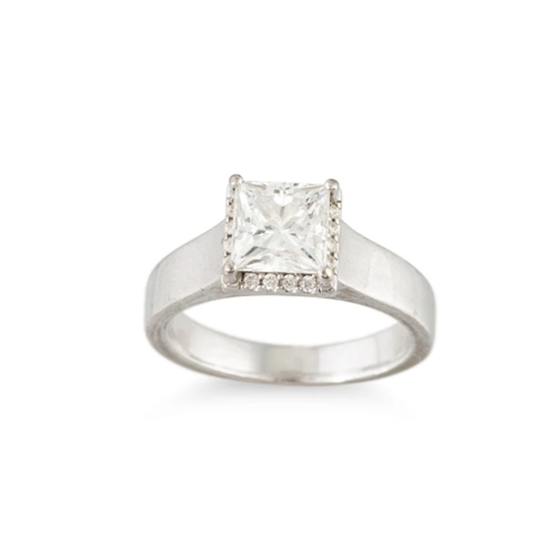 A DIAMOND SOLITAIRE RING, the princess cut diamond to round ...