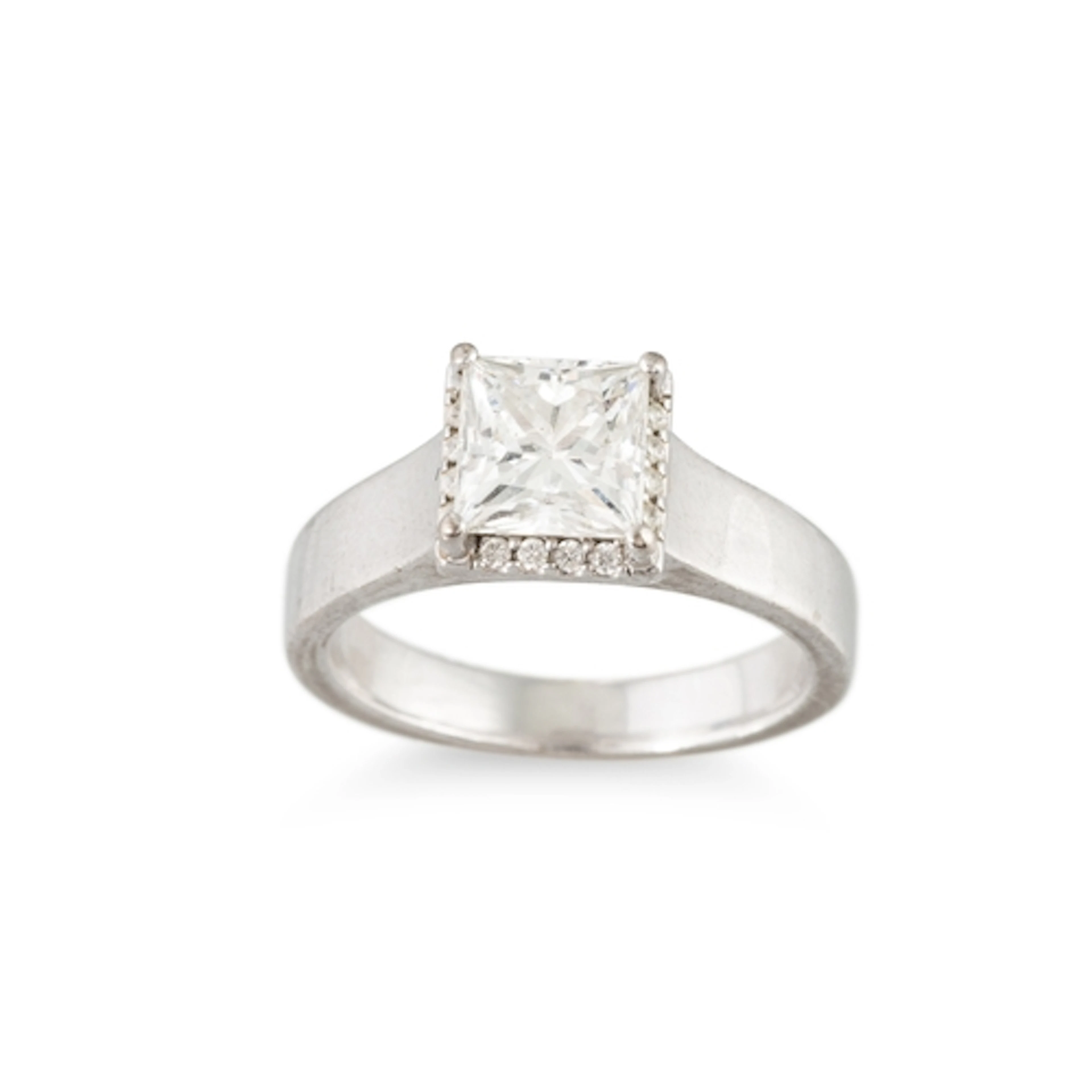 A DIAMOND SOLITAIRE RING, the princess cut diamond to round ...