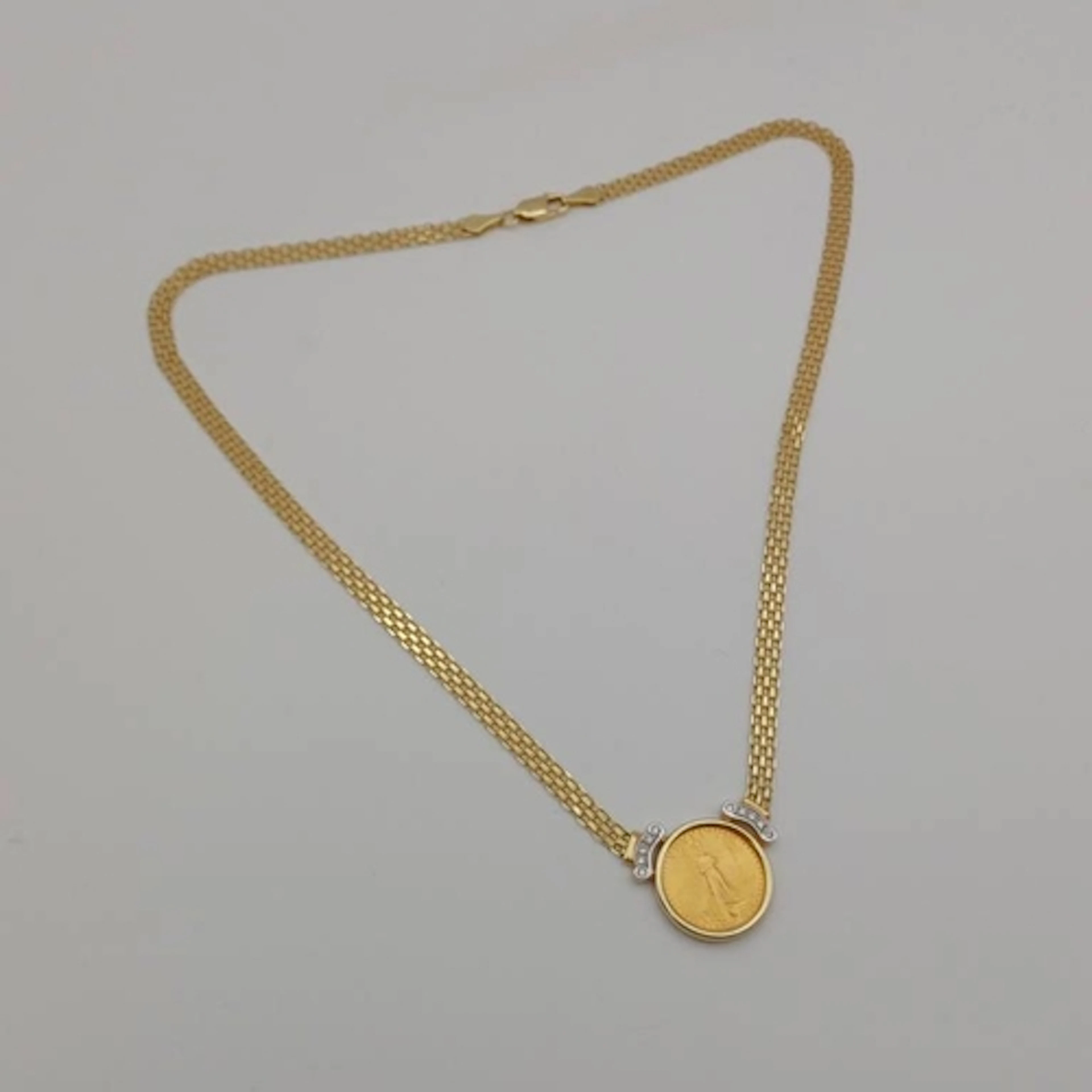 1/10 OZ FINE GOLD 2003 5 DOLLAR COIN ON A 14K GOLD & DIAMOND...