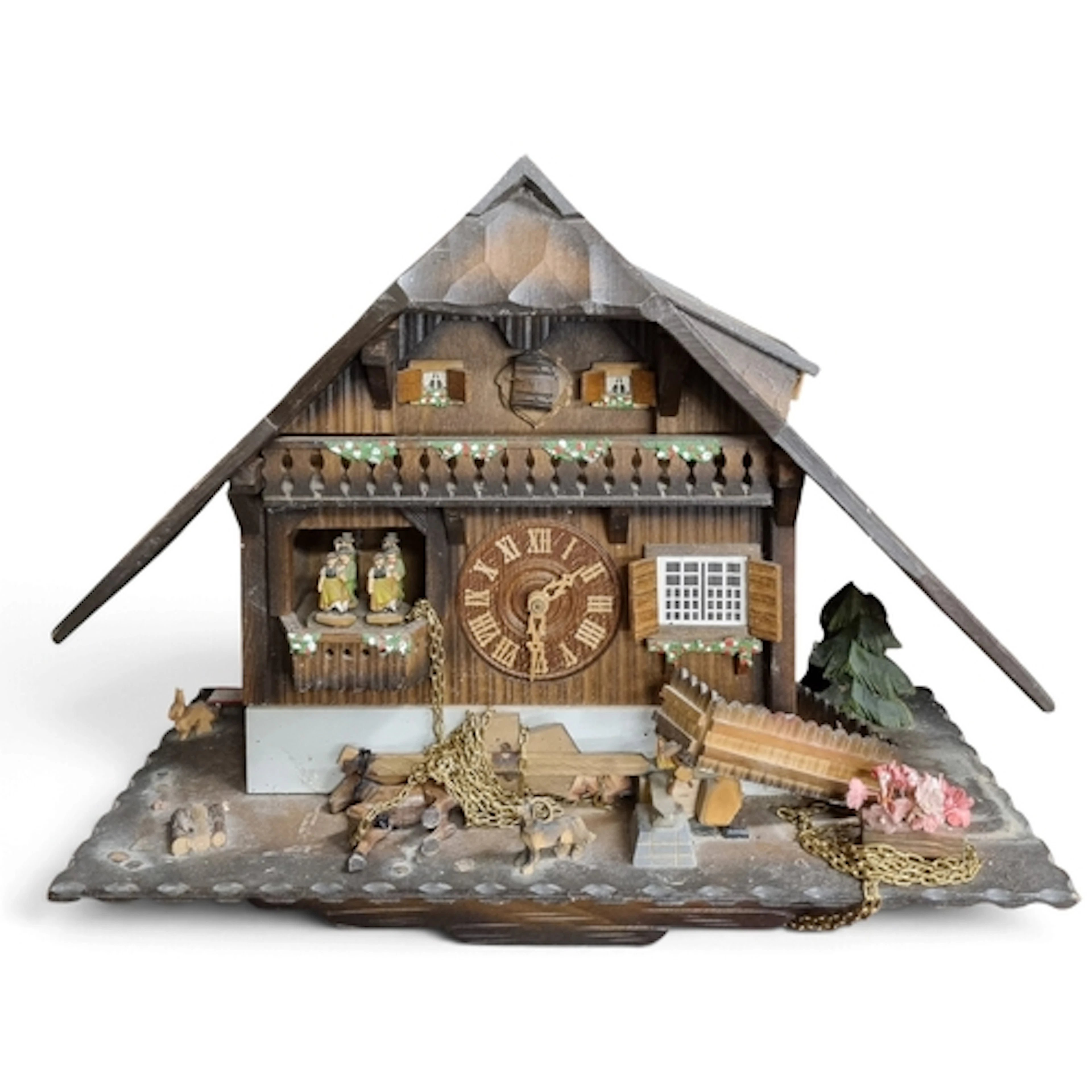 A Cuckoo Clock. H 40 x W 48 x D 24 cm approx.