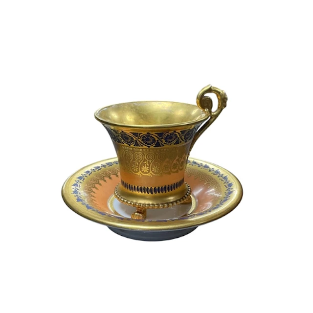 A French old Paris empire style porcelain cabinet cup and sa...