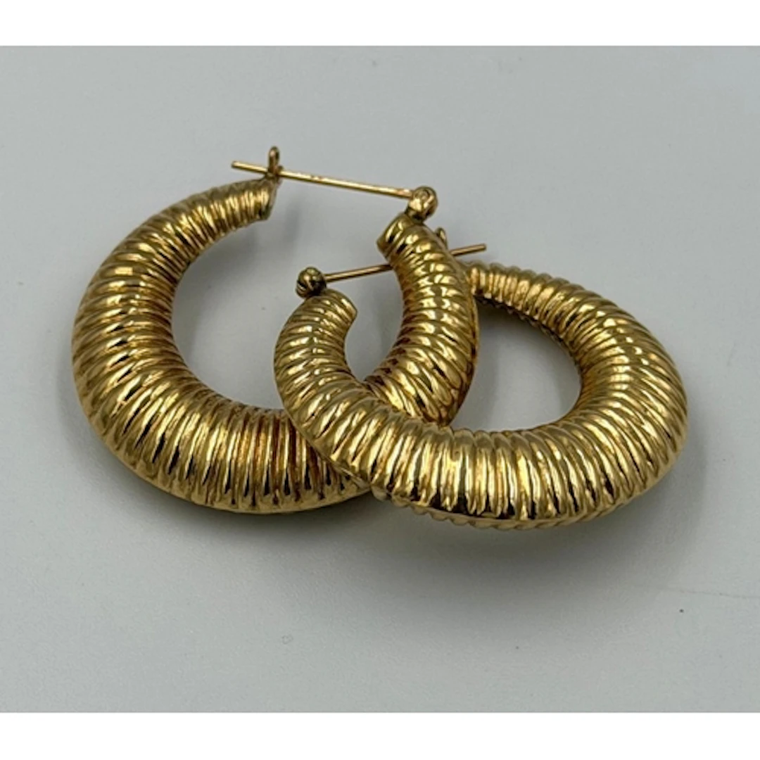 A pair of 14ct yellow gold shell themed earrings, approximat...