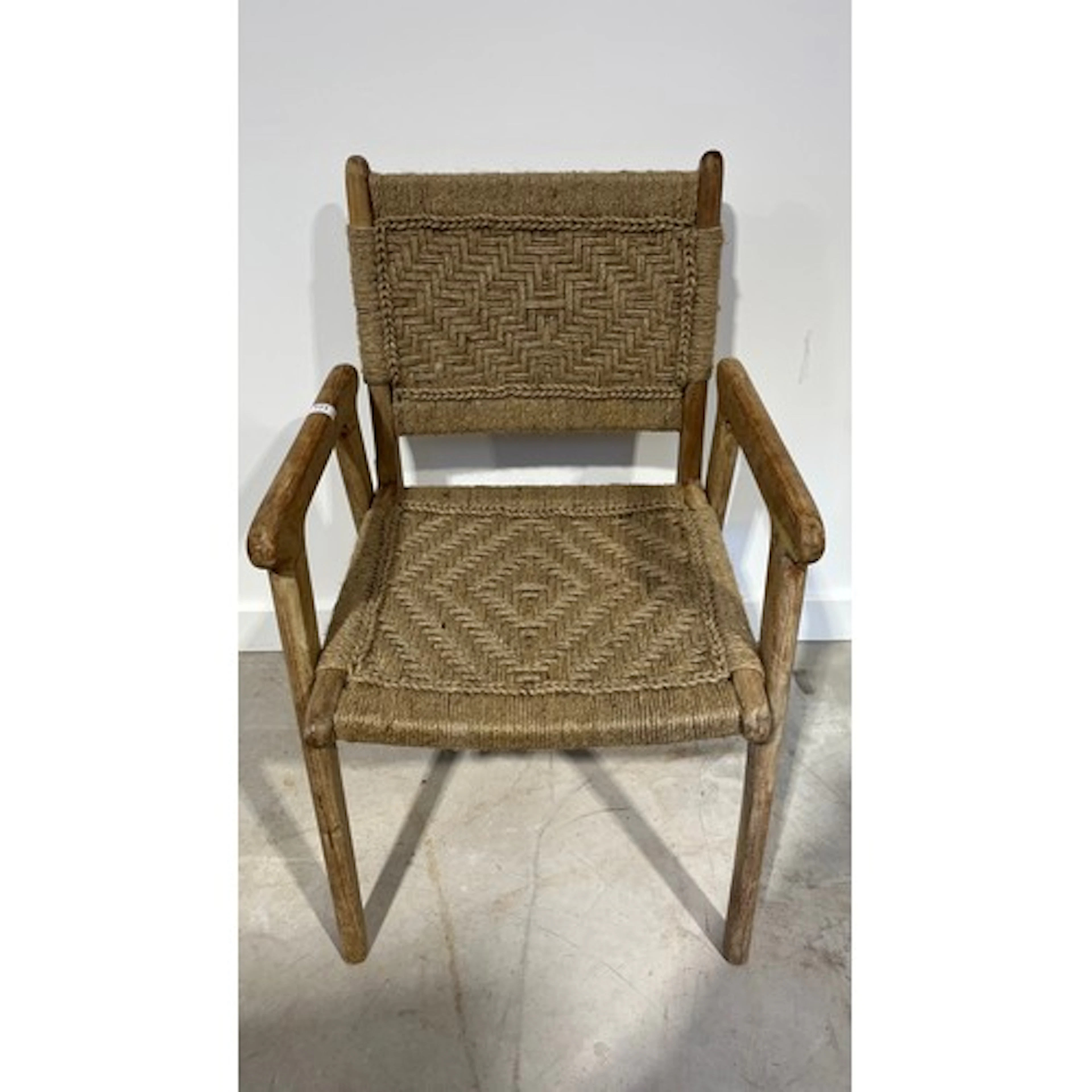 Nkuku Vinay woven dining chair.