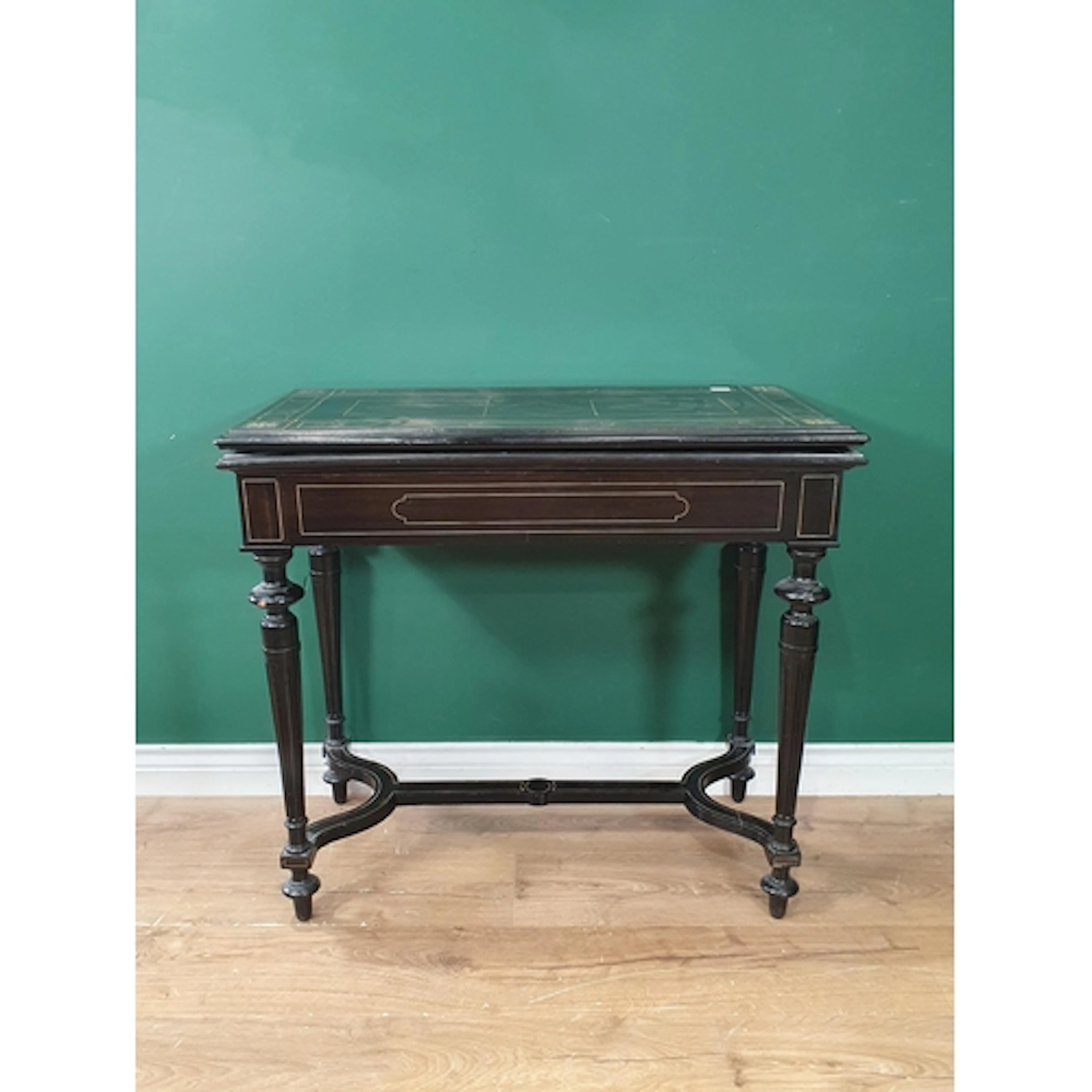 An antique Irish coromandel and ebonised Card Table, the fol...