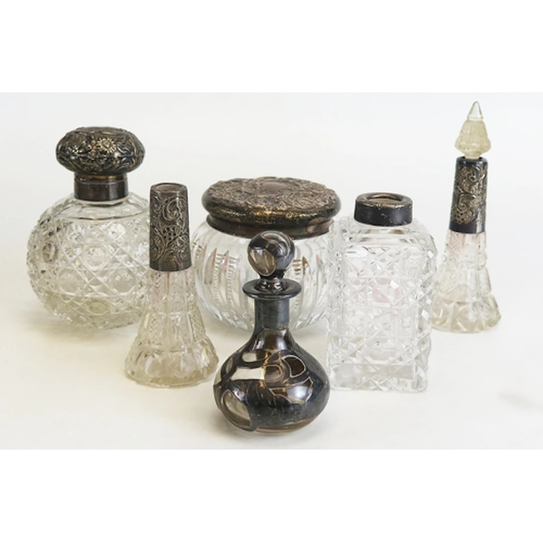 Assorted silver mounted glass dressing table wears including...