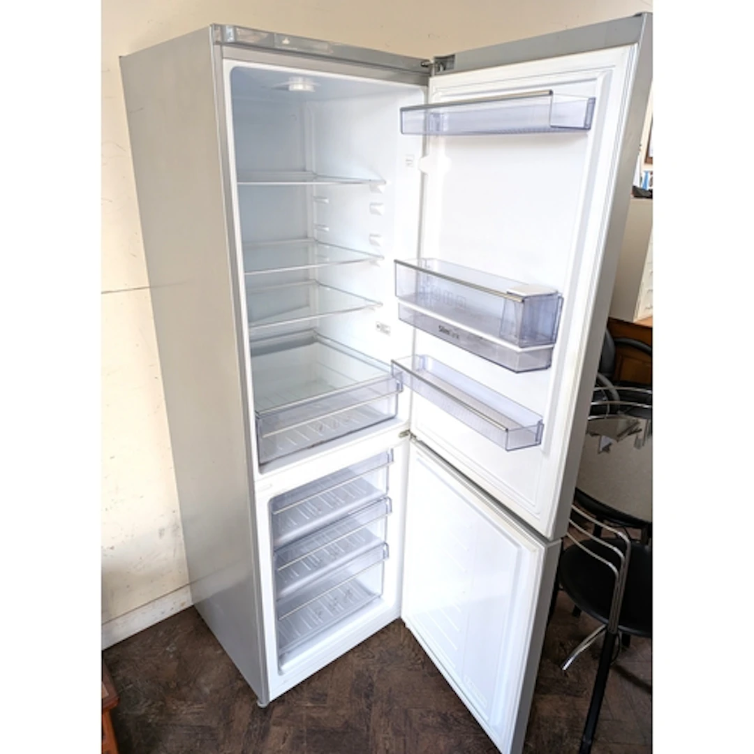A Beko half and half fridge freezer with water dispenser in ...
