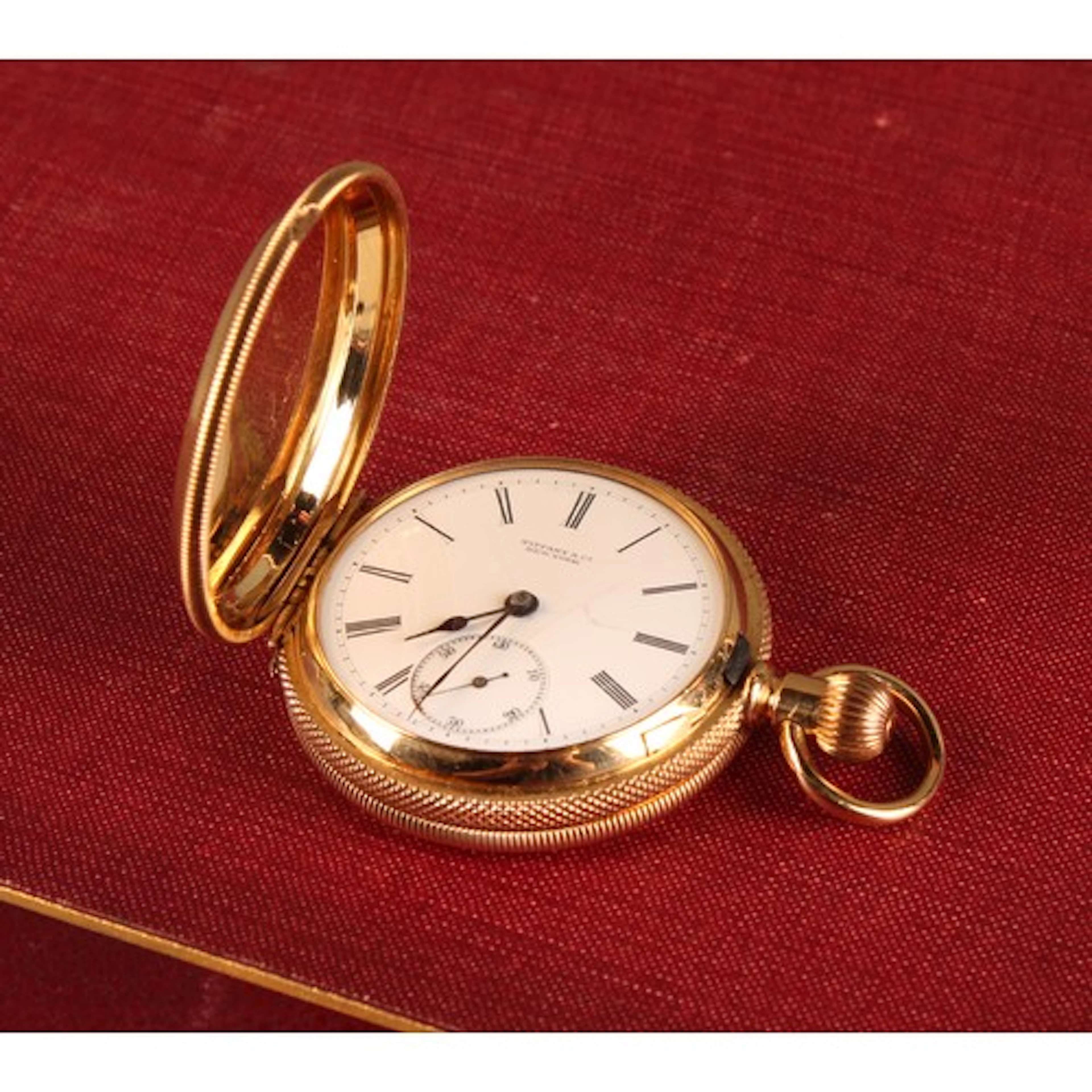 An 18k gold Tiffany & Co. New York lady's hunter pocket watc...