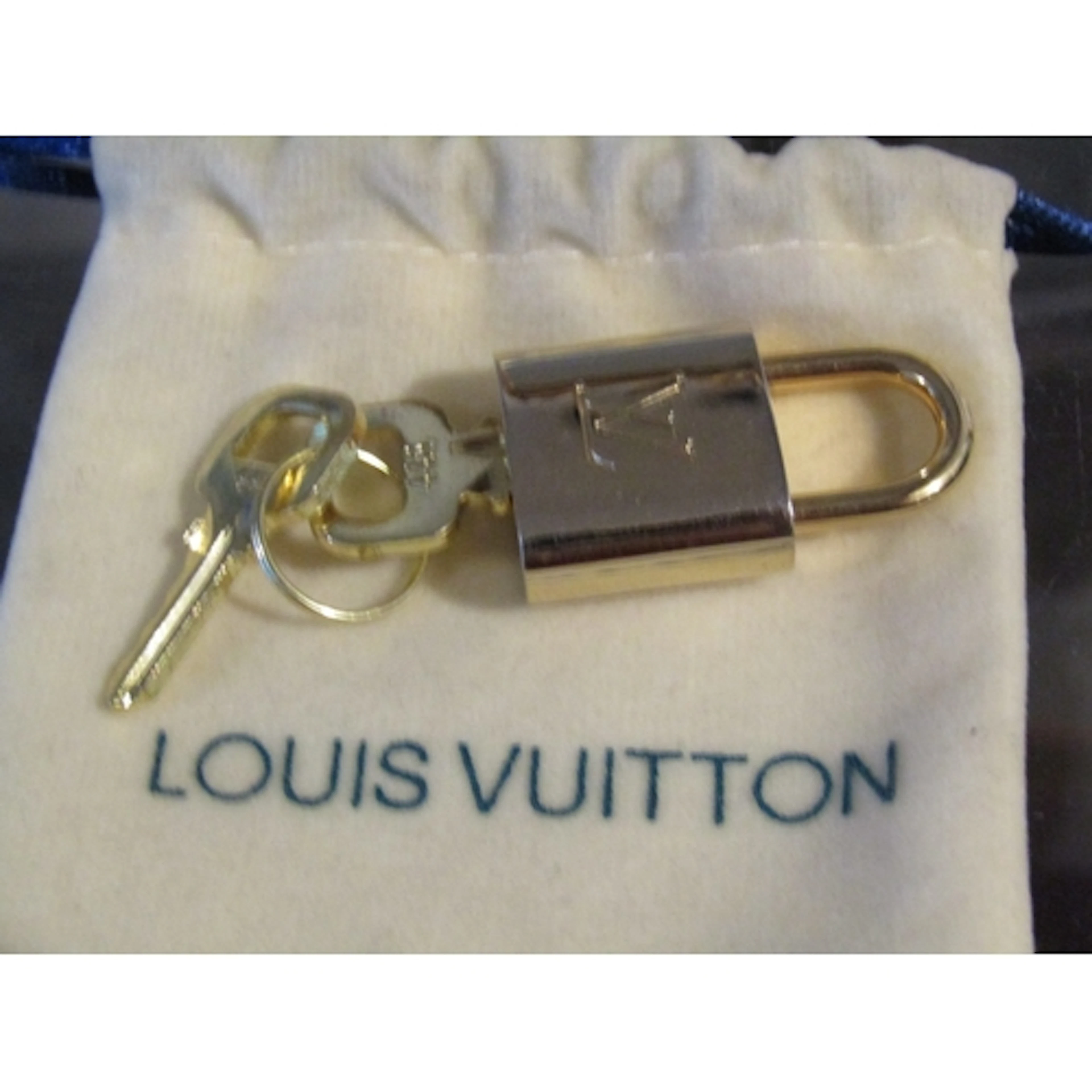 Louis Vuitton Lock and Key with Protective Pouch