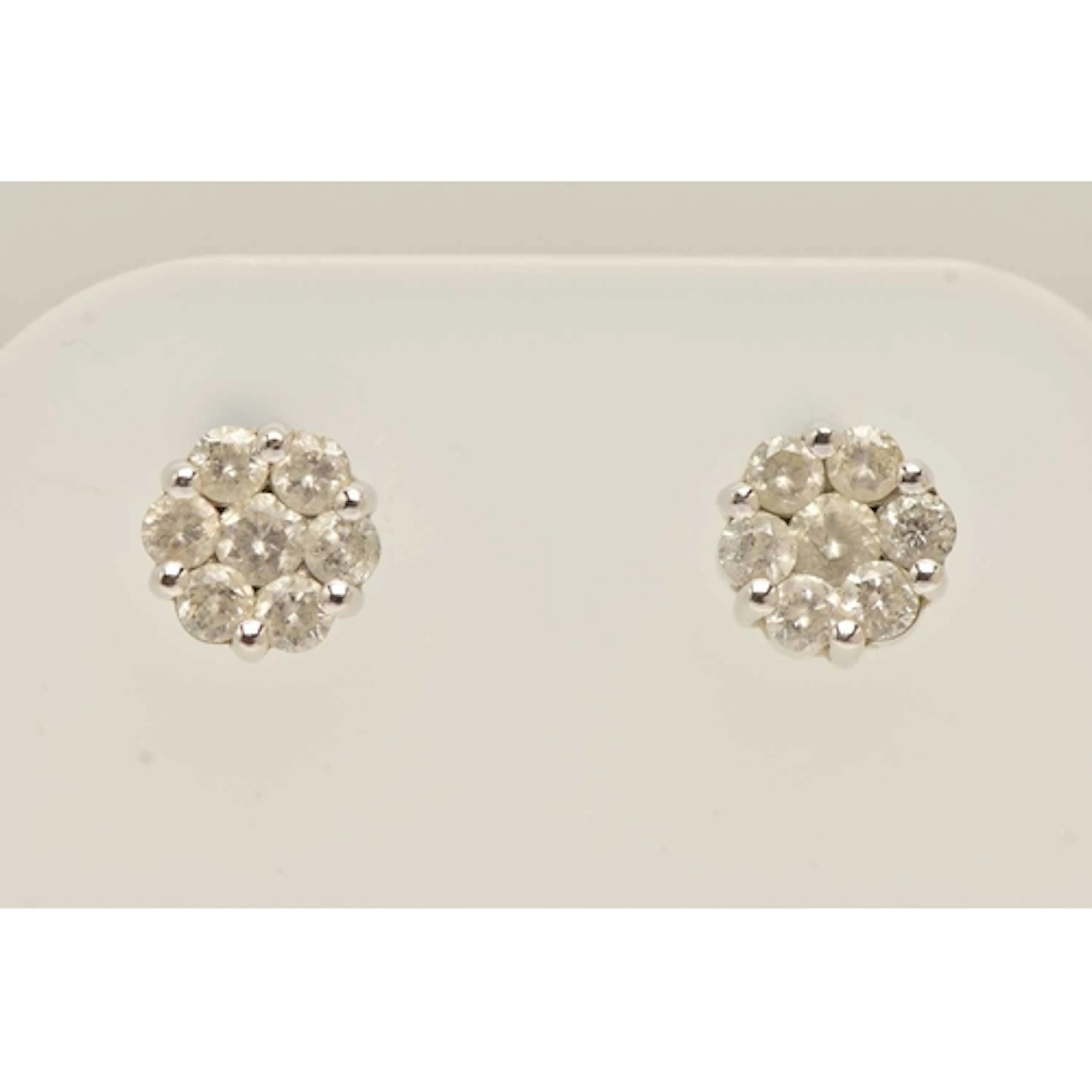A PAIR OF 18CT WHITE GOLD DIAMOND CLUSTER EARRINGS, seven ro...