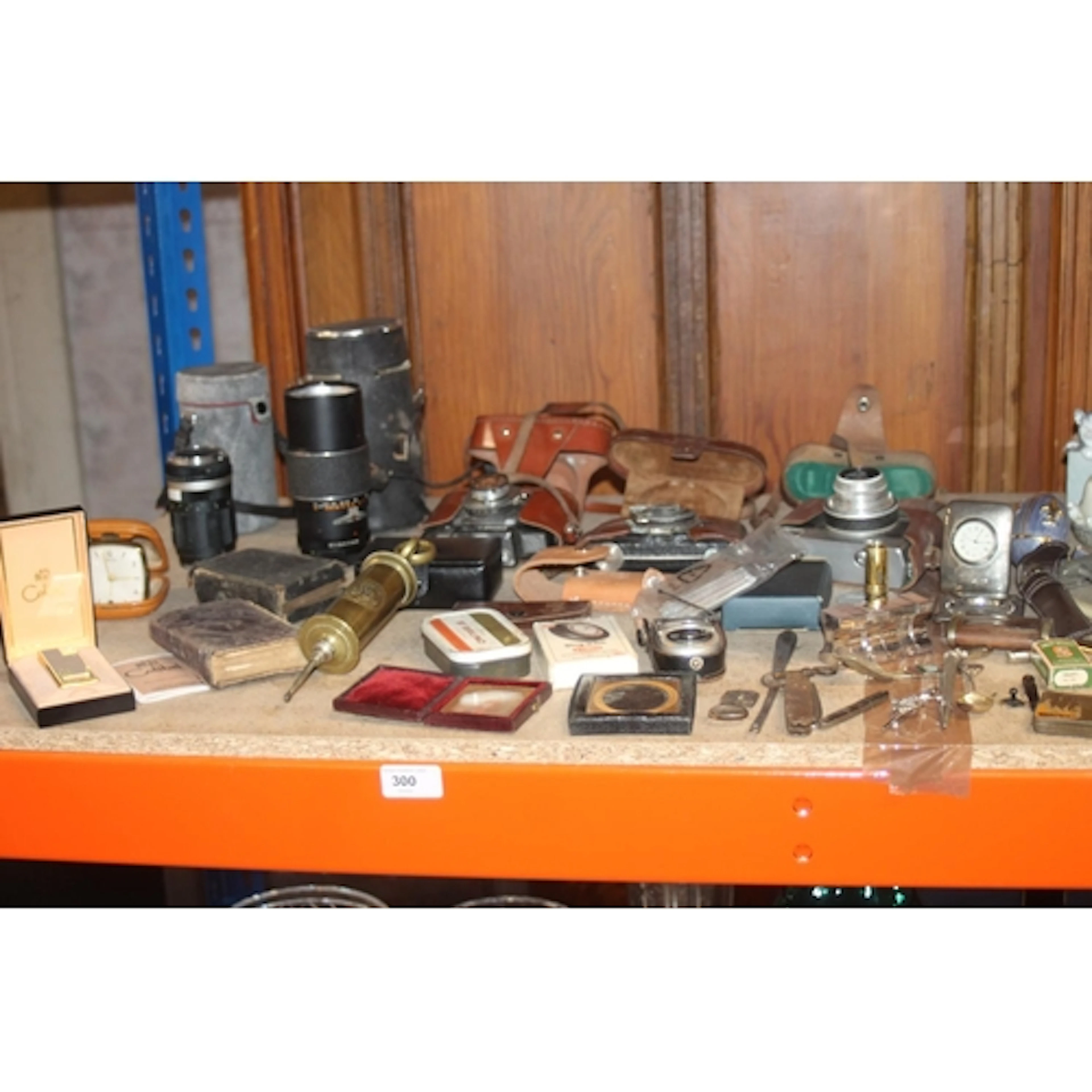 Colibri boxed lighter, camera lenses, vintage cameras, Bible...