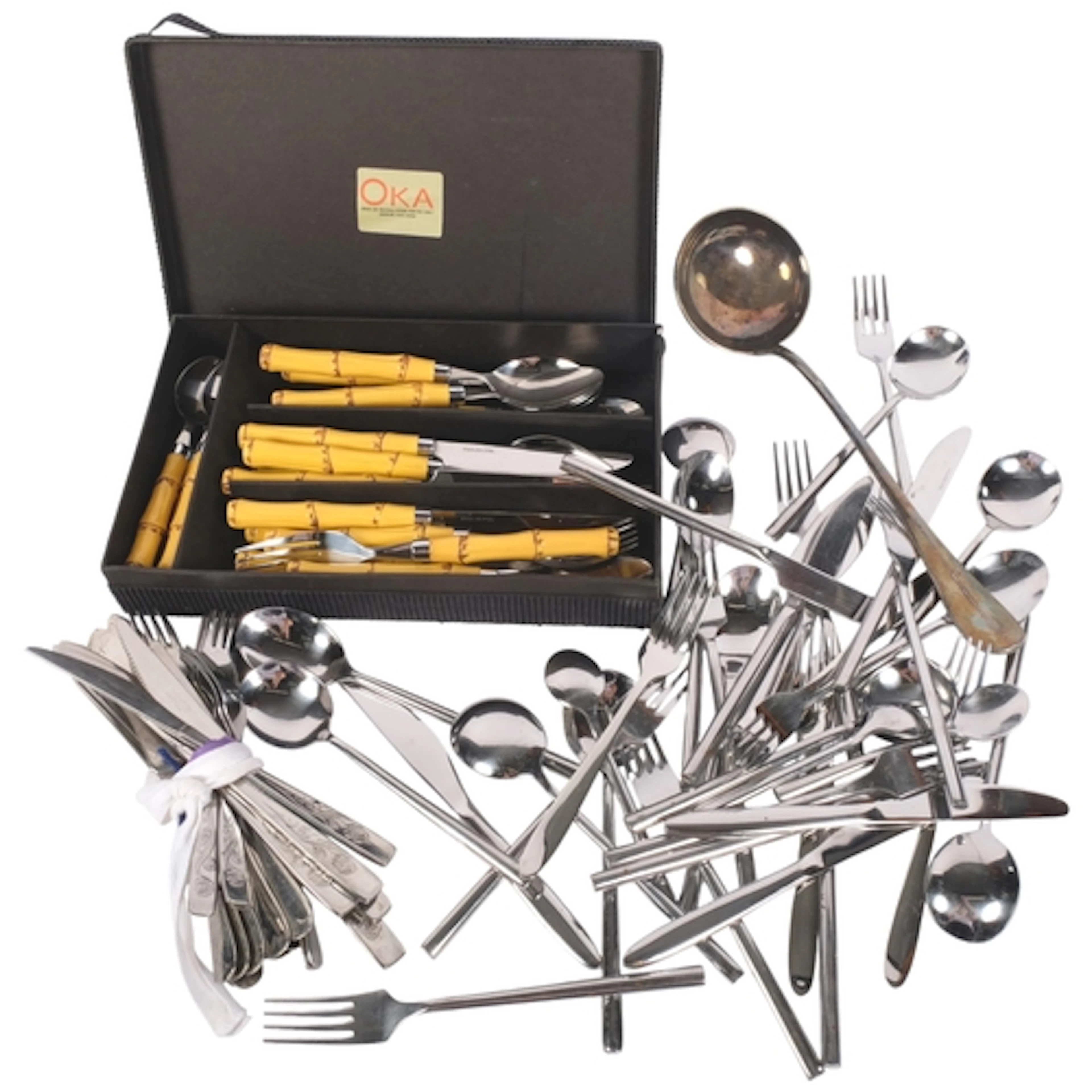 A collection of assorted stainless steel flatware, including...