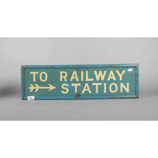 Vintage wooden railway station sign.
