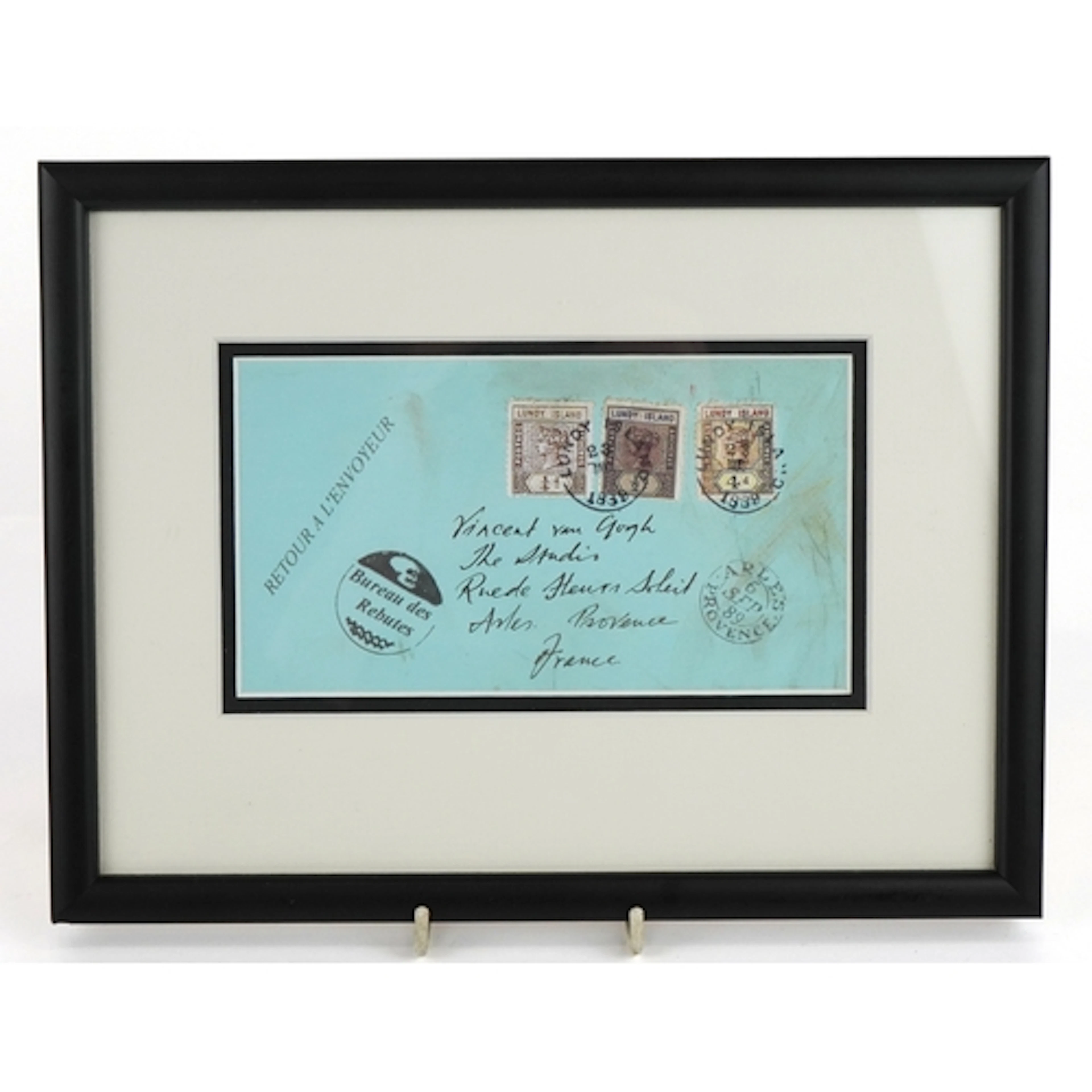 A framed and glazed envelope addressed to Vincent Van Gogh a...