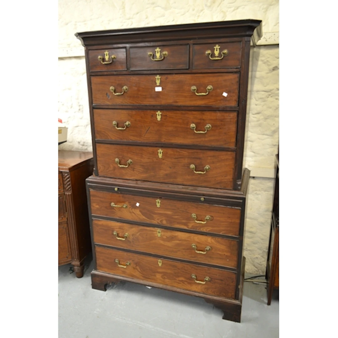 George III mahogany tallboy, having three short and six long...