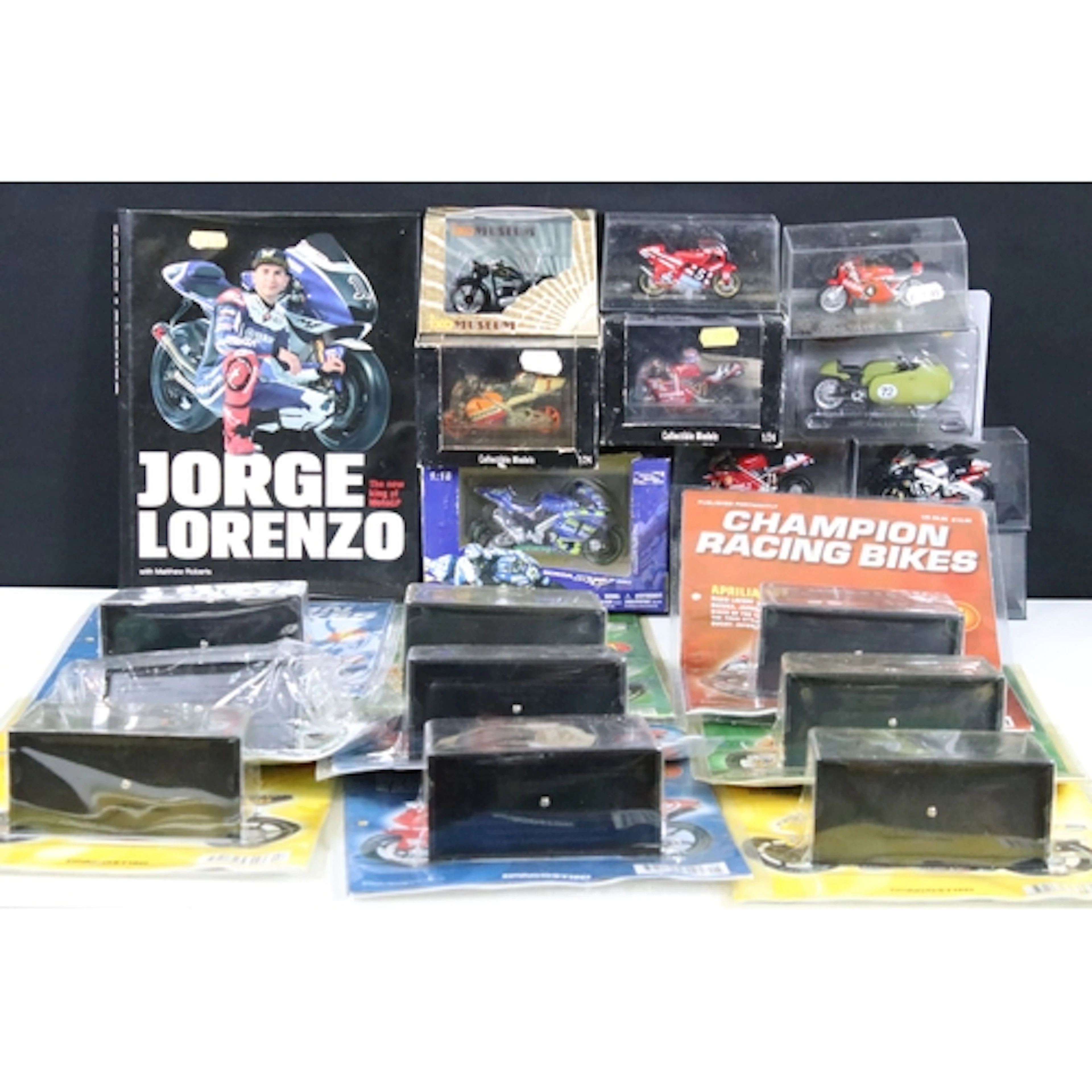 23 Boxed / cased diecast model motorbikes to include 12 x De...