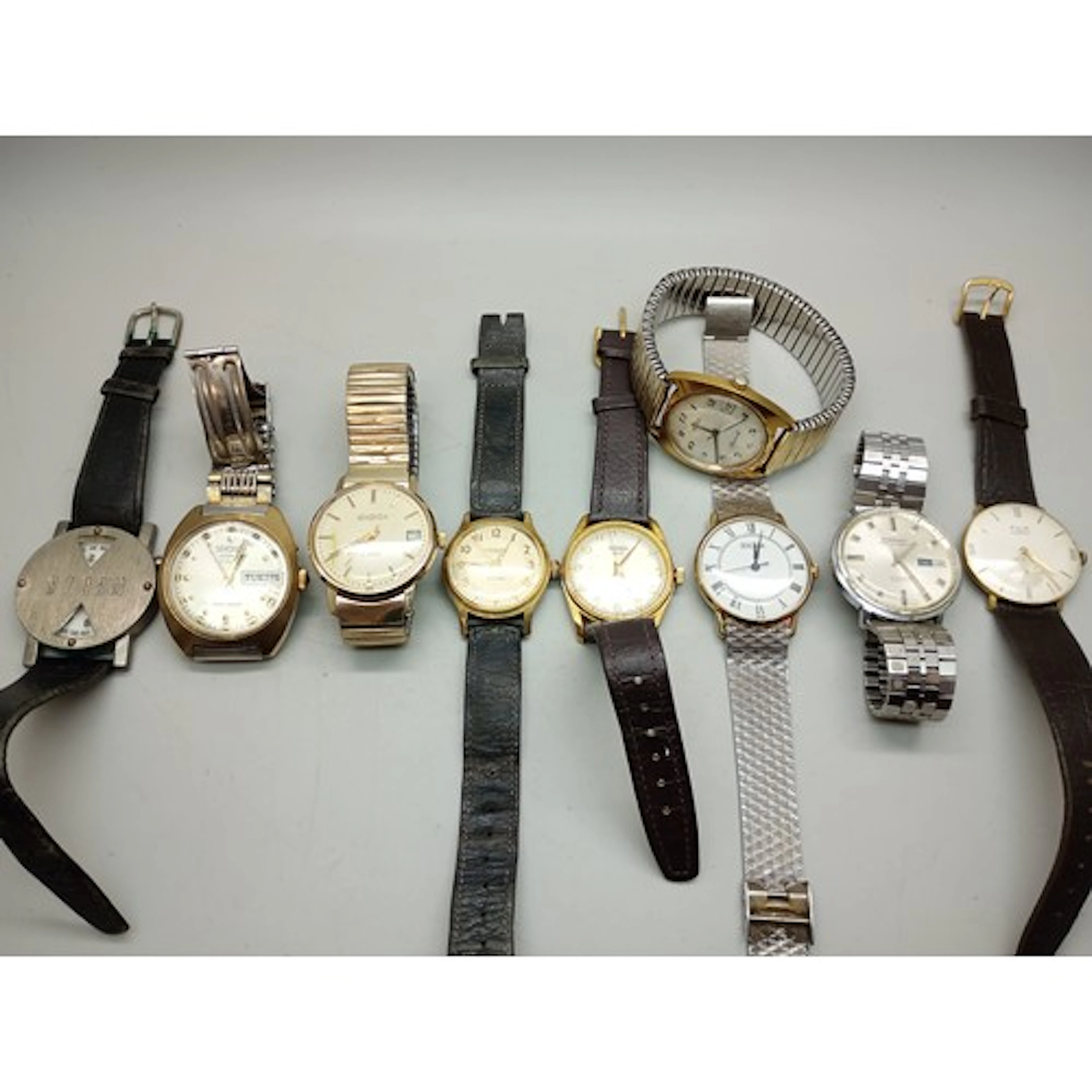 A collection of wristwatches including Sekonda, Roamer and I...