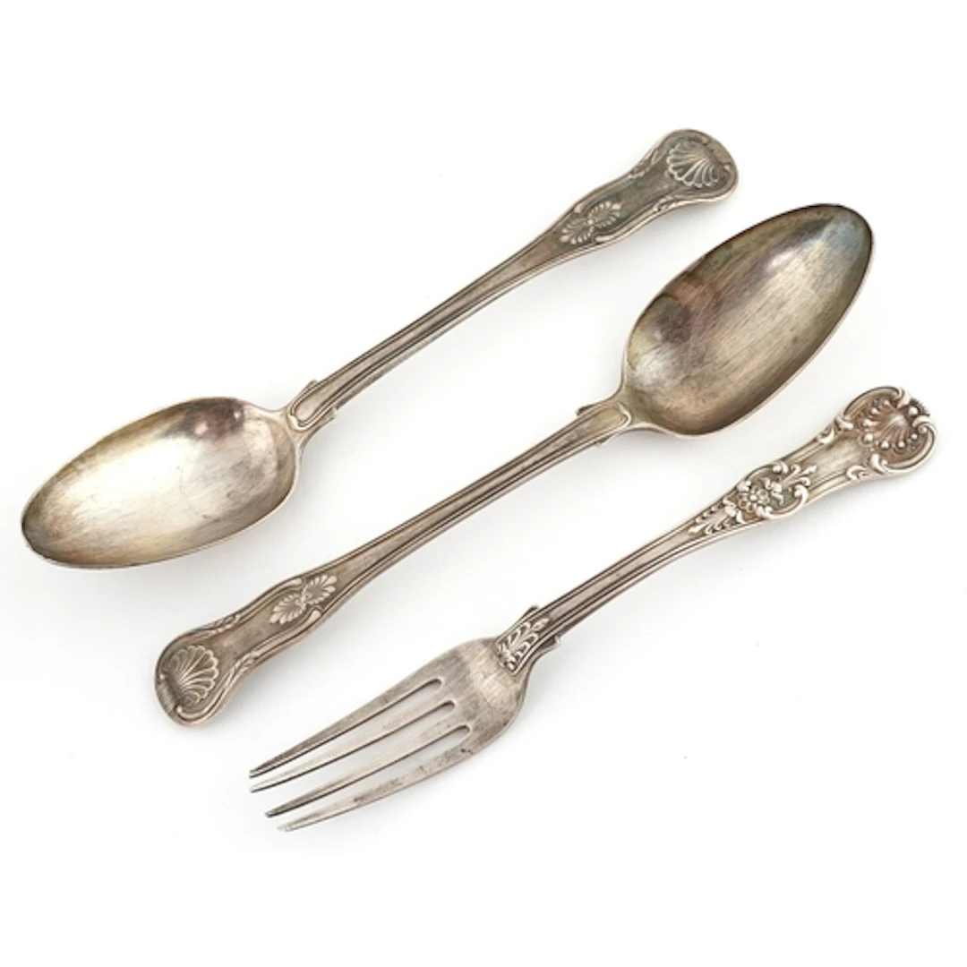 Pair of William Eaton silver table spoons and matching fork,...