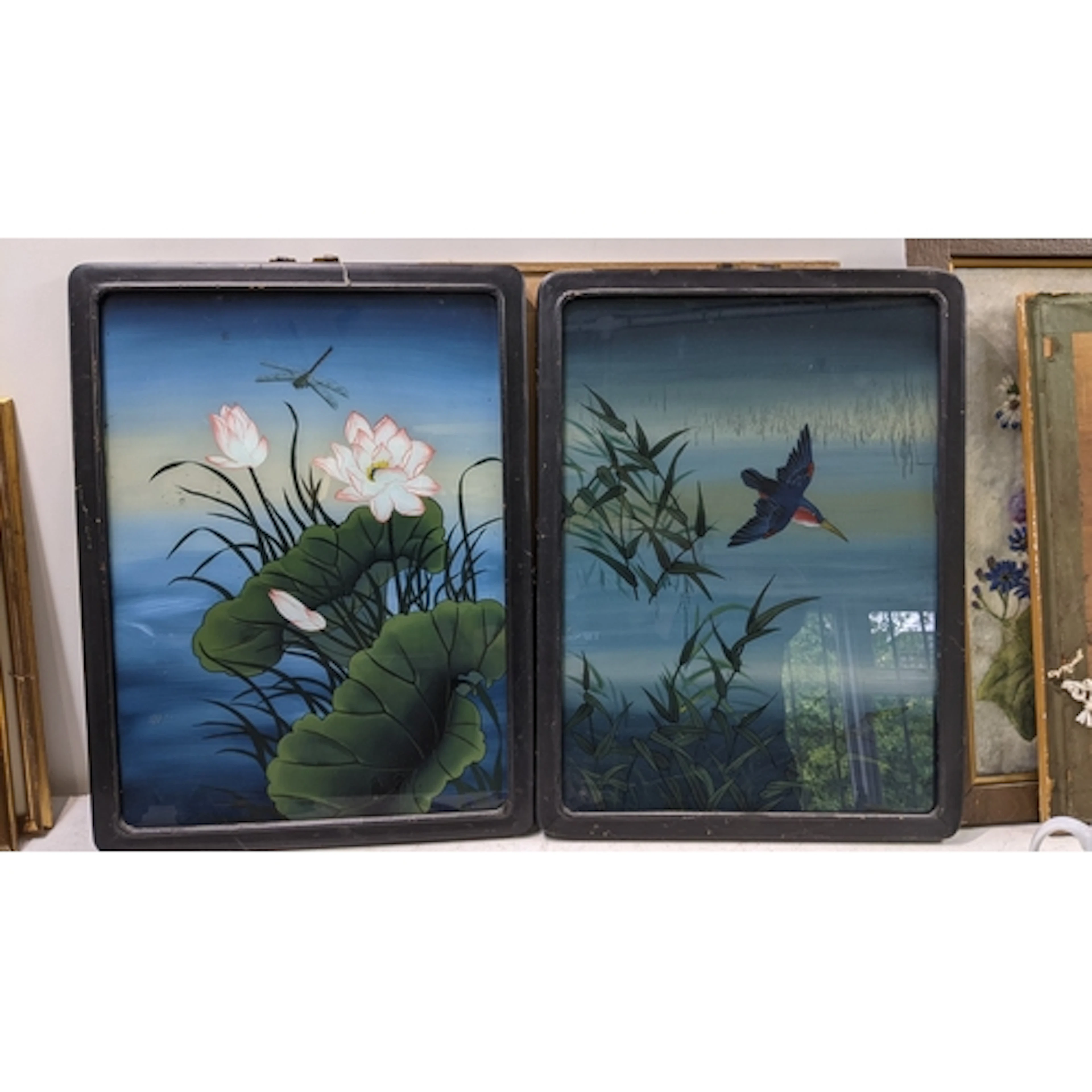 Two early 20th century Chinese reverse glass paintings to in...