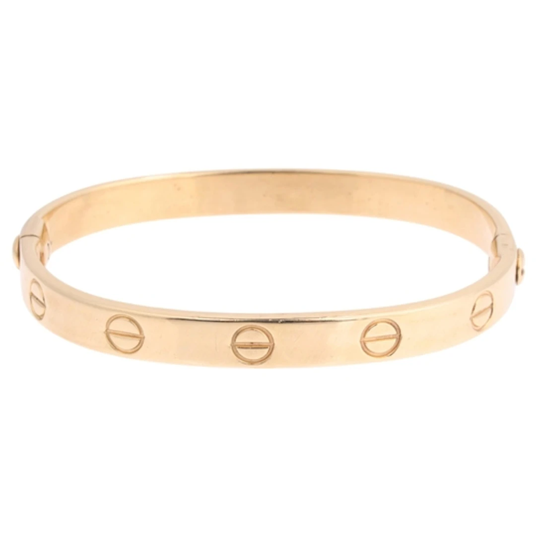 A Contemporary 9ct gold bangle, maker AMJ, no Birmingham dat...