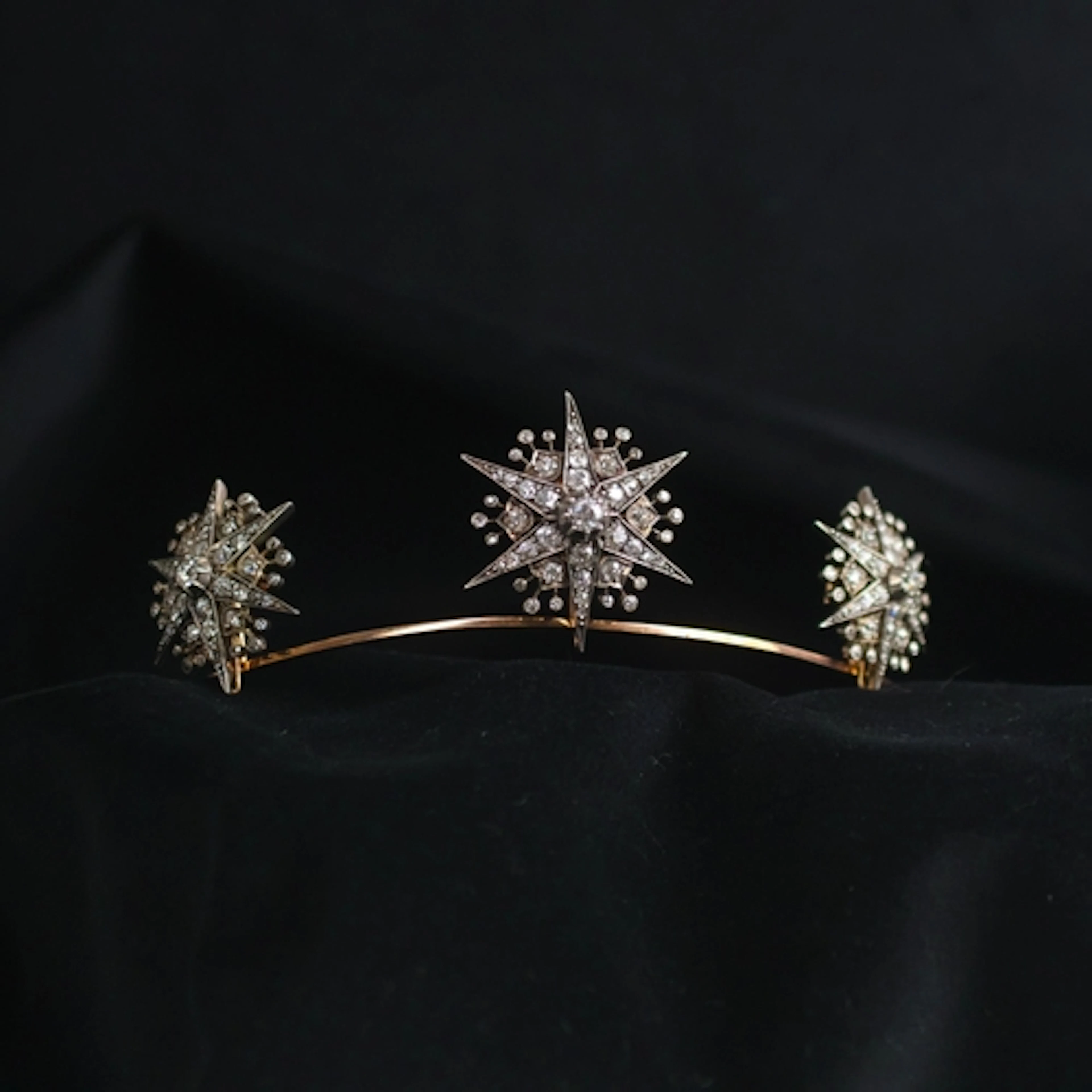 A 19th century trio of diamond brooches converting to a tiar...