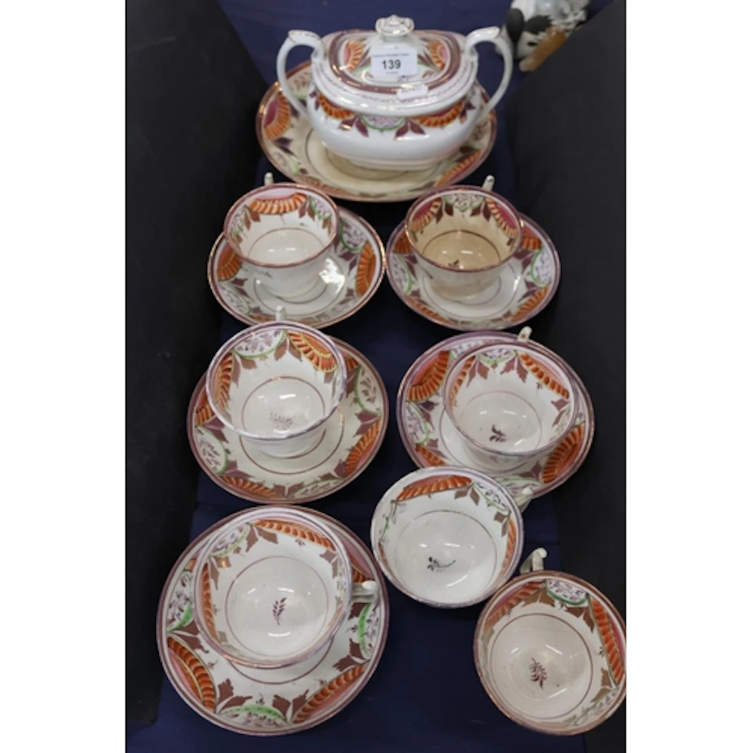 Sunderland ware part teaset comprising cups, saucers, dishes...