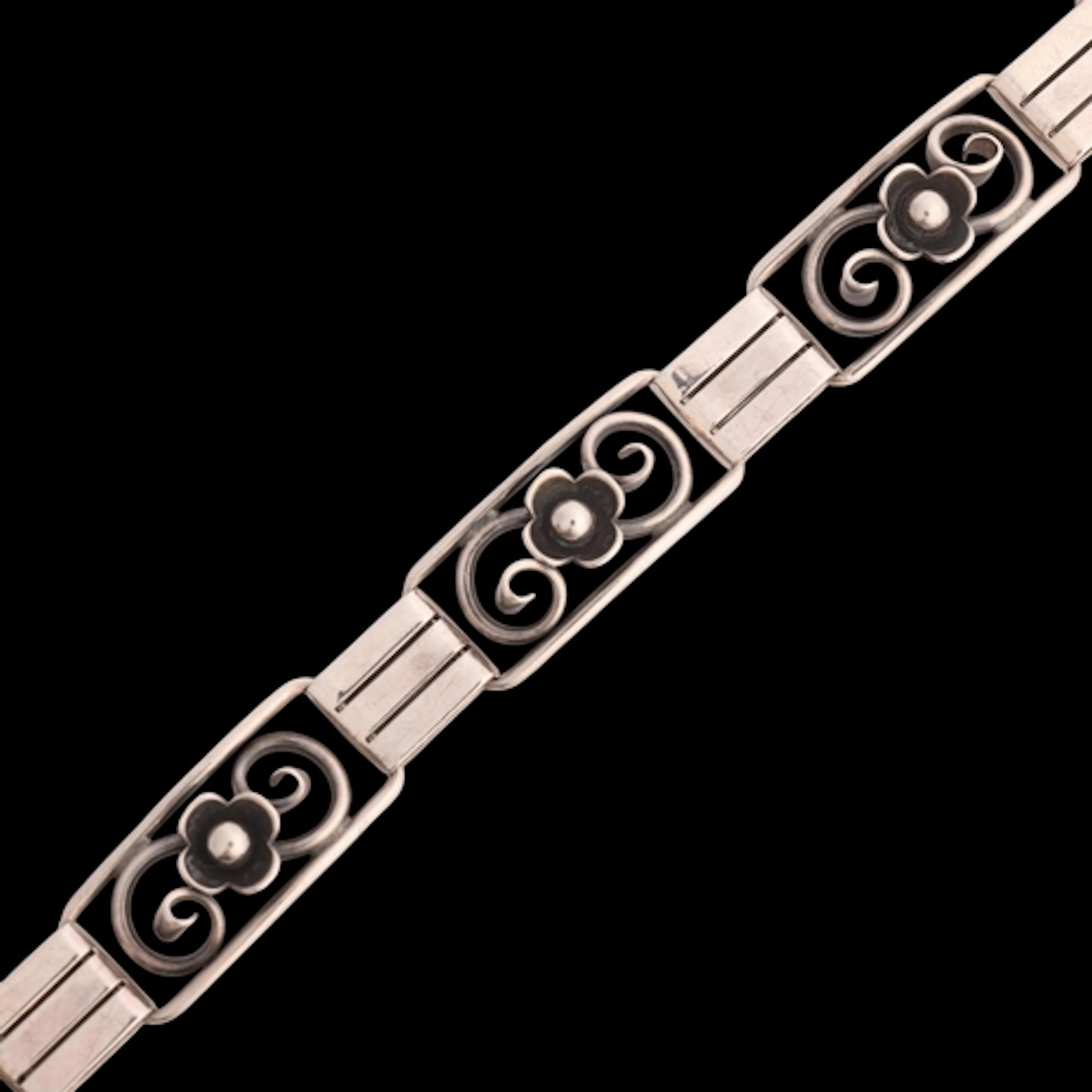 JOHN LAURITZEN - an Art Deco style Danish silver panel brace...