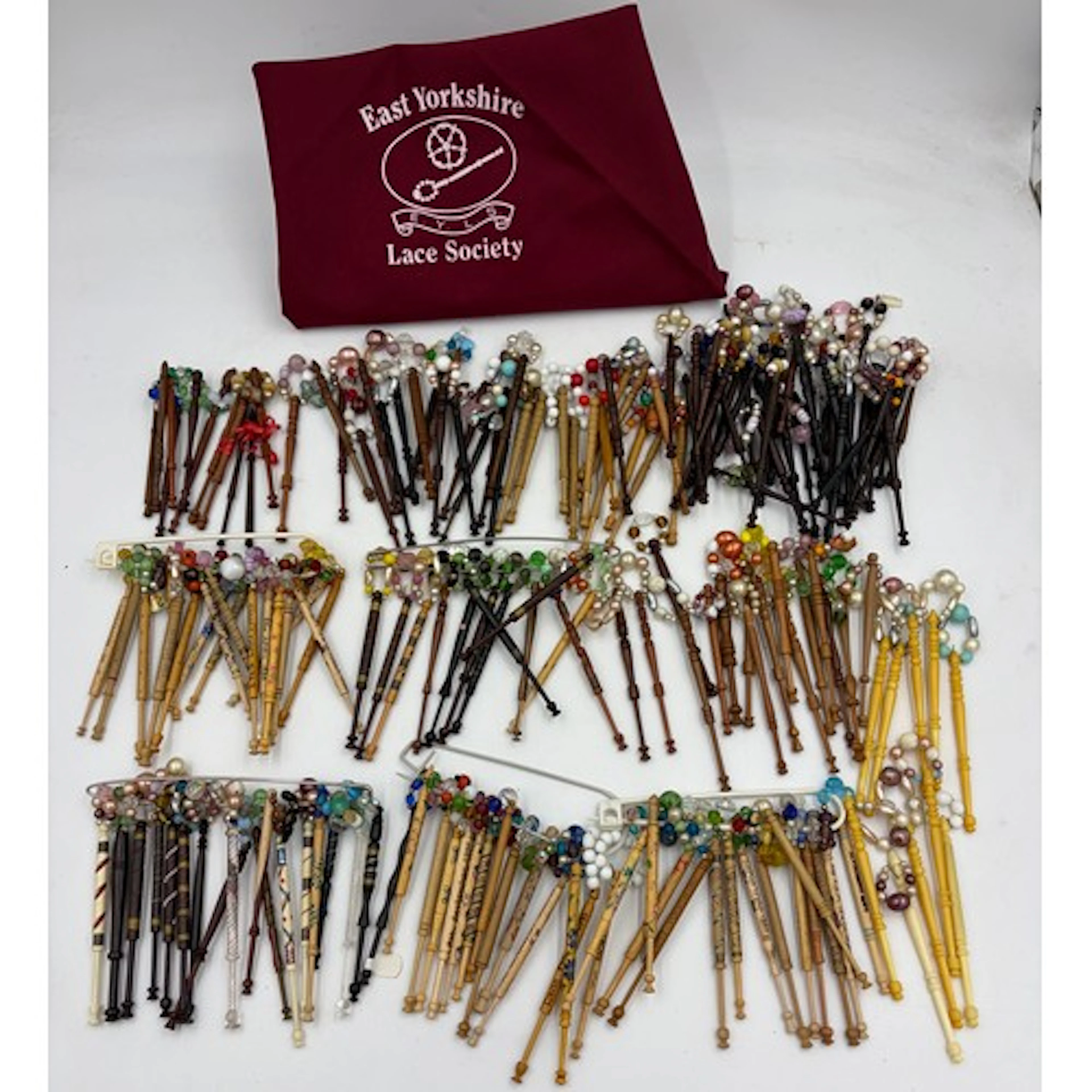 Large collection of vintage and modern lace making bobbins, ...
