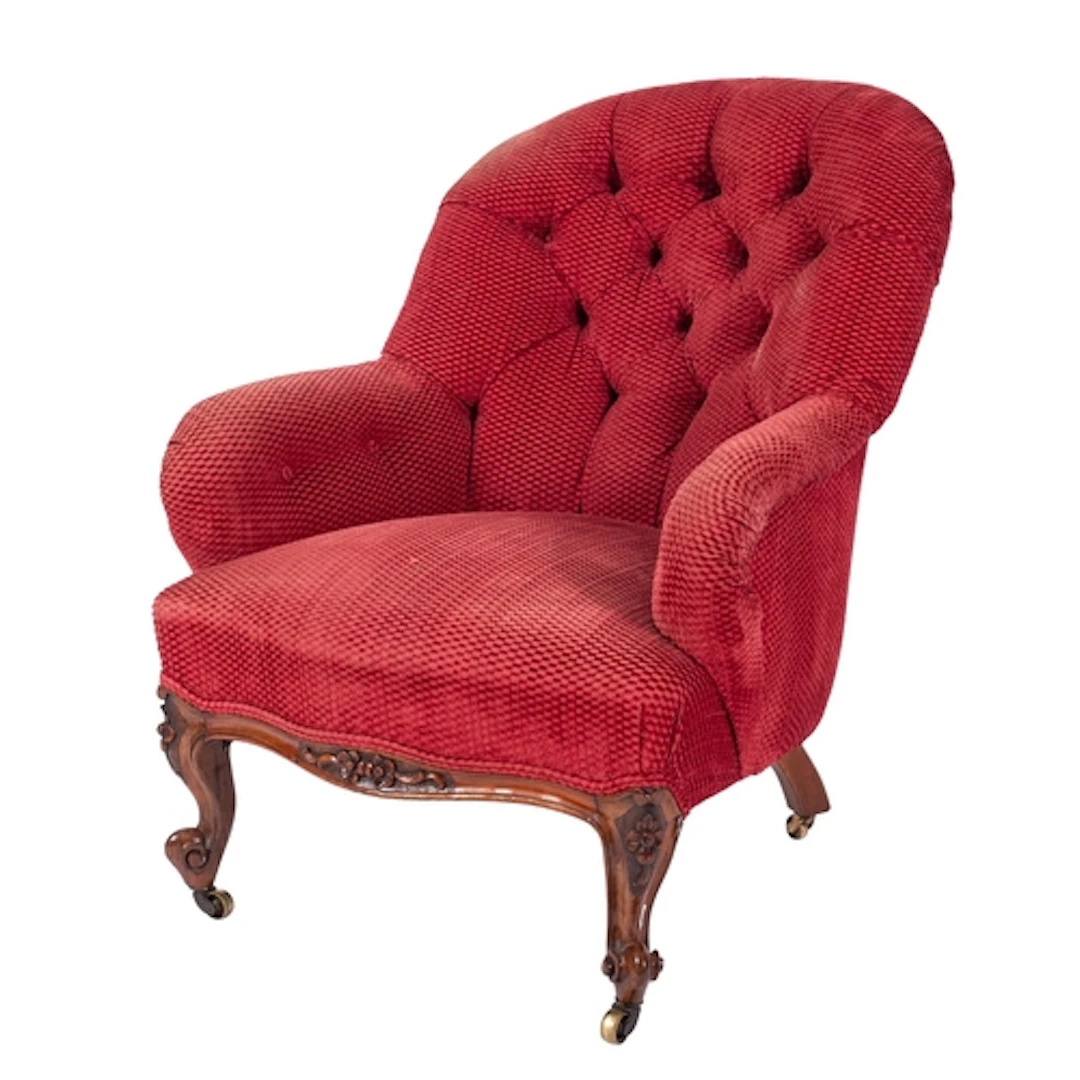 A Victorian button back upholstered armchair, late 19th Cent...