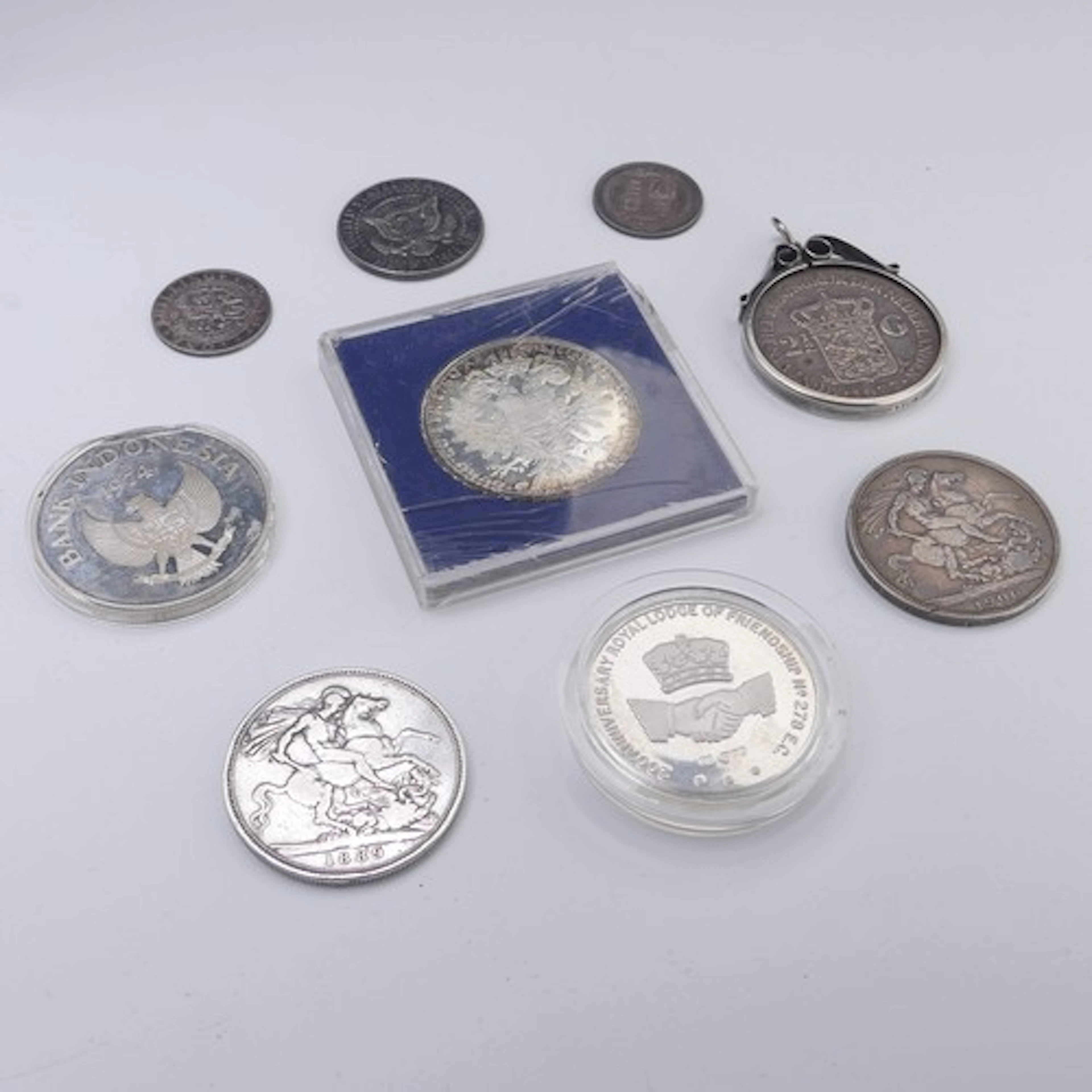 A quantity of silver Coins, including a sterling silver Maso...