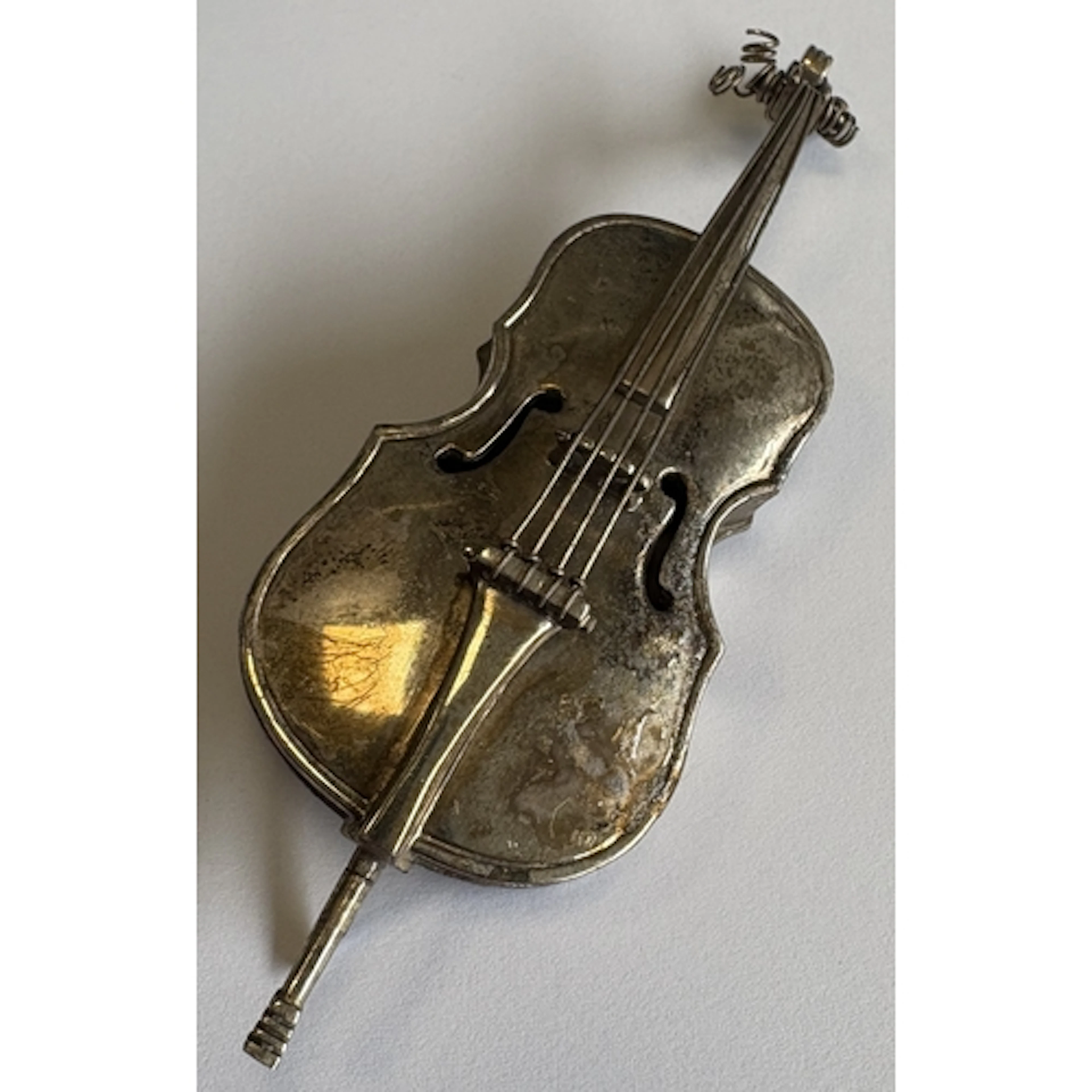 A Continental silver model of a cello. Approx. 37 grams. Est...