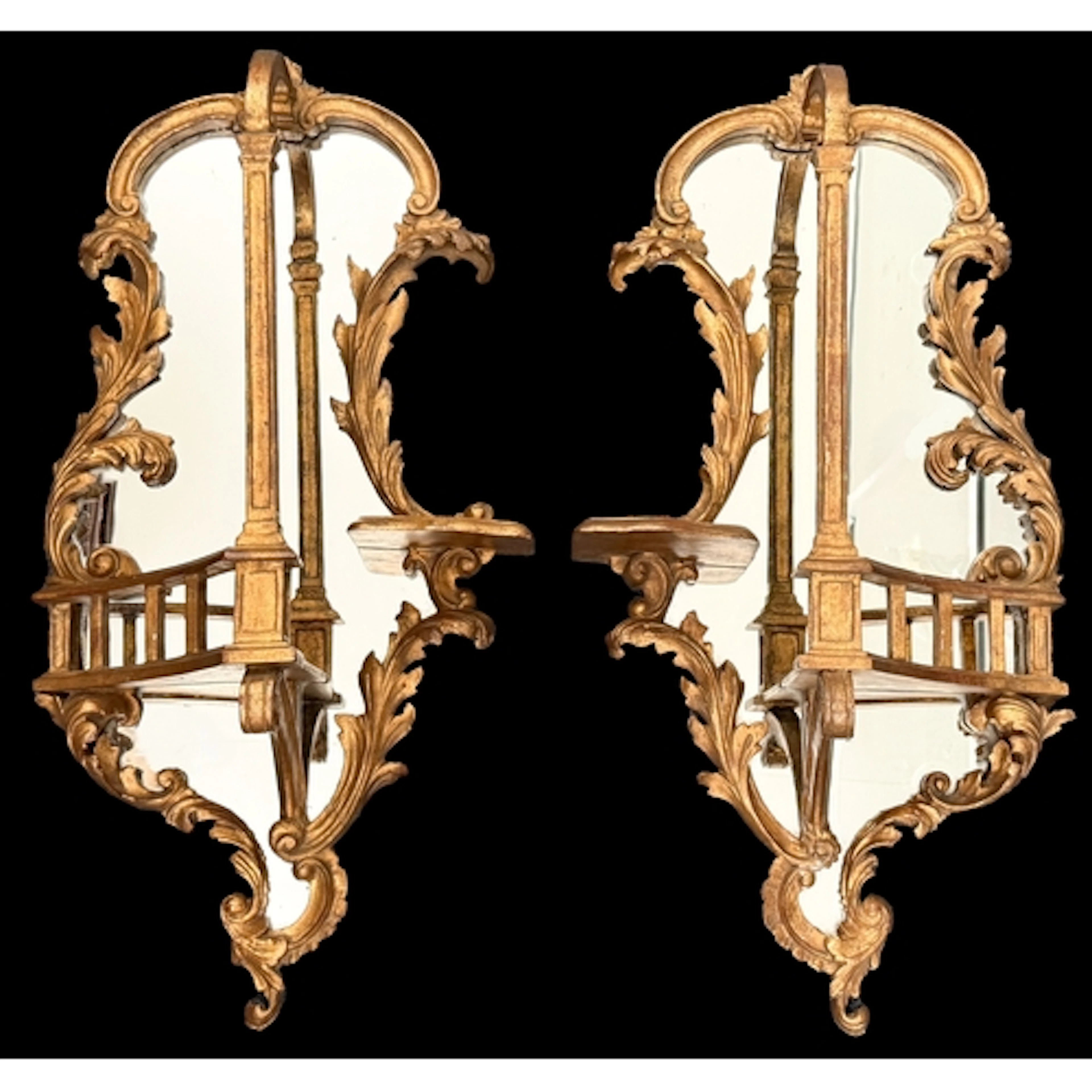 A pair of 18th century style giltwood mirrors in the rococo ...