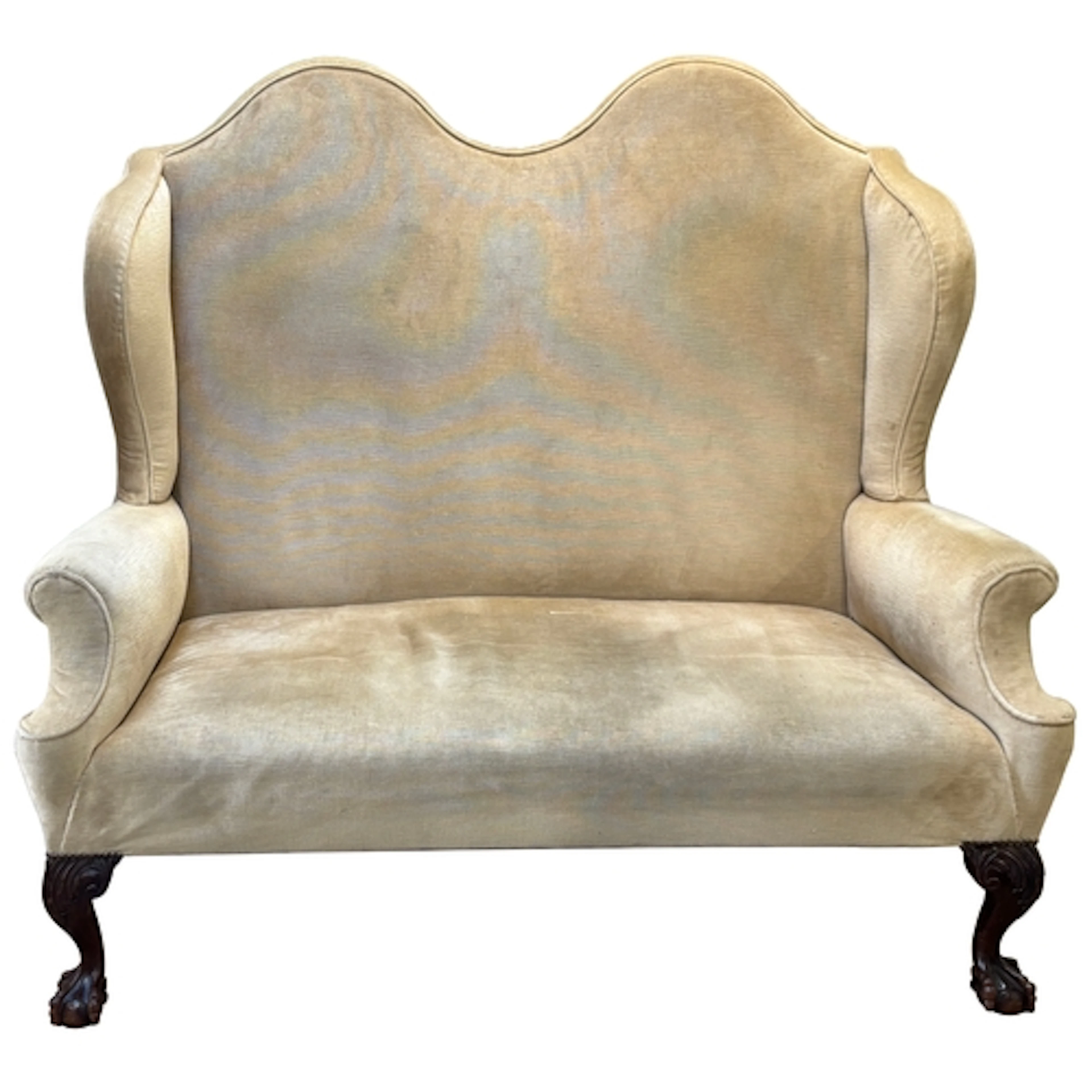 A two seater double humpback sofa in Queen Anne style, on ca...