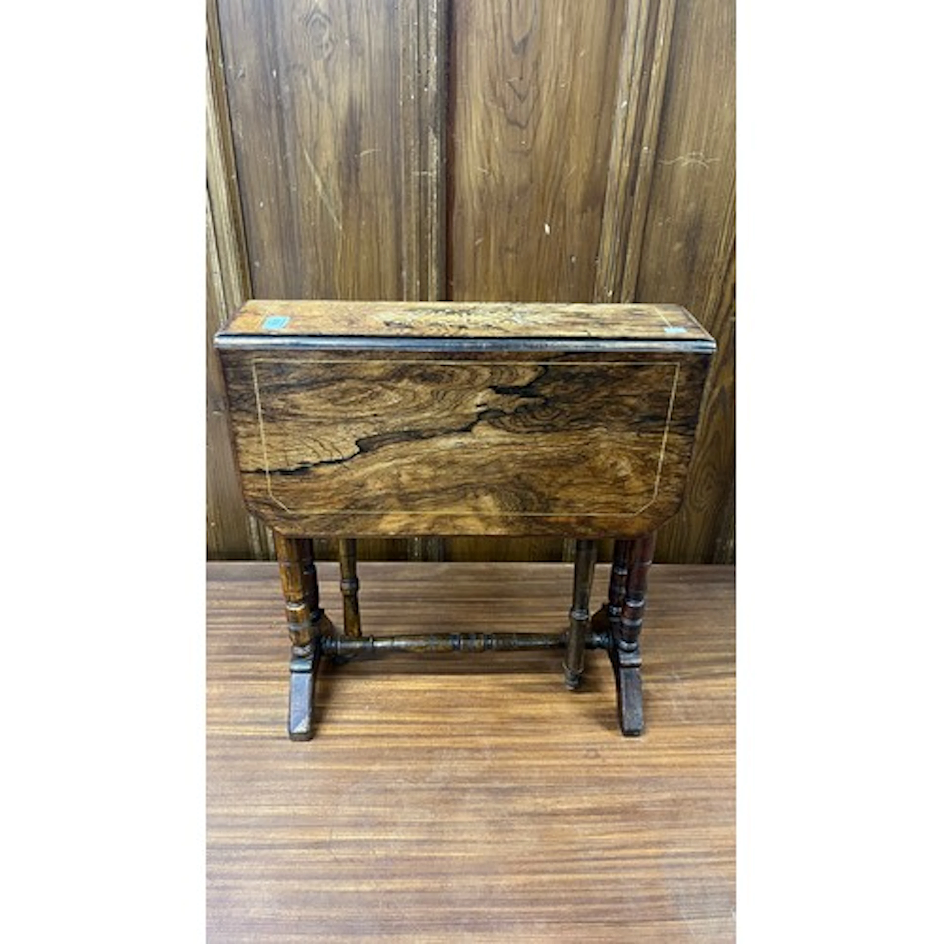 Antique burr walnut and inlaid Sutherland table.