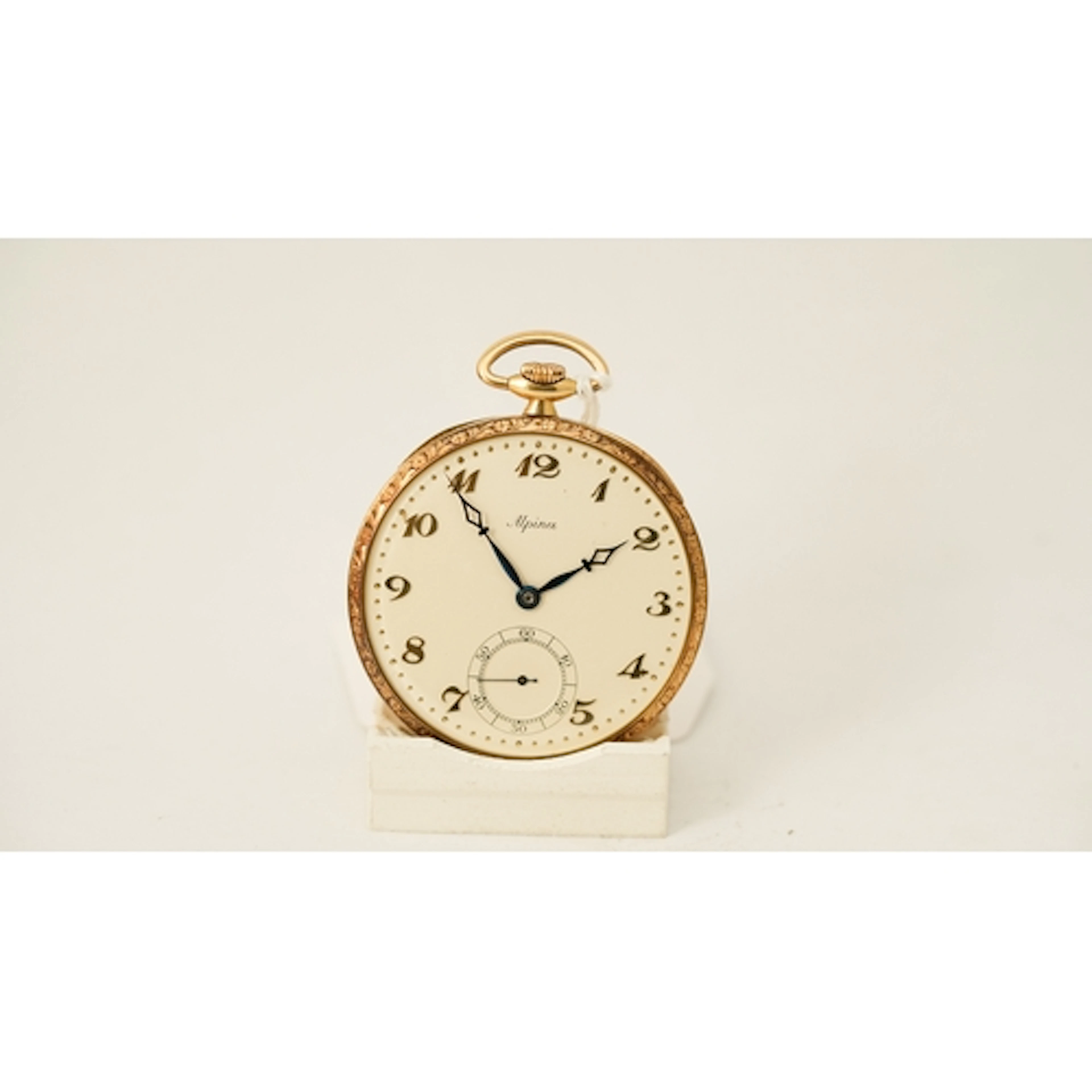 Alpina open face pocket watch in 18kt gold. 43mm. Cream dial...