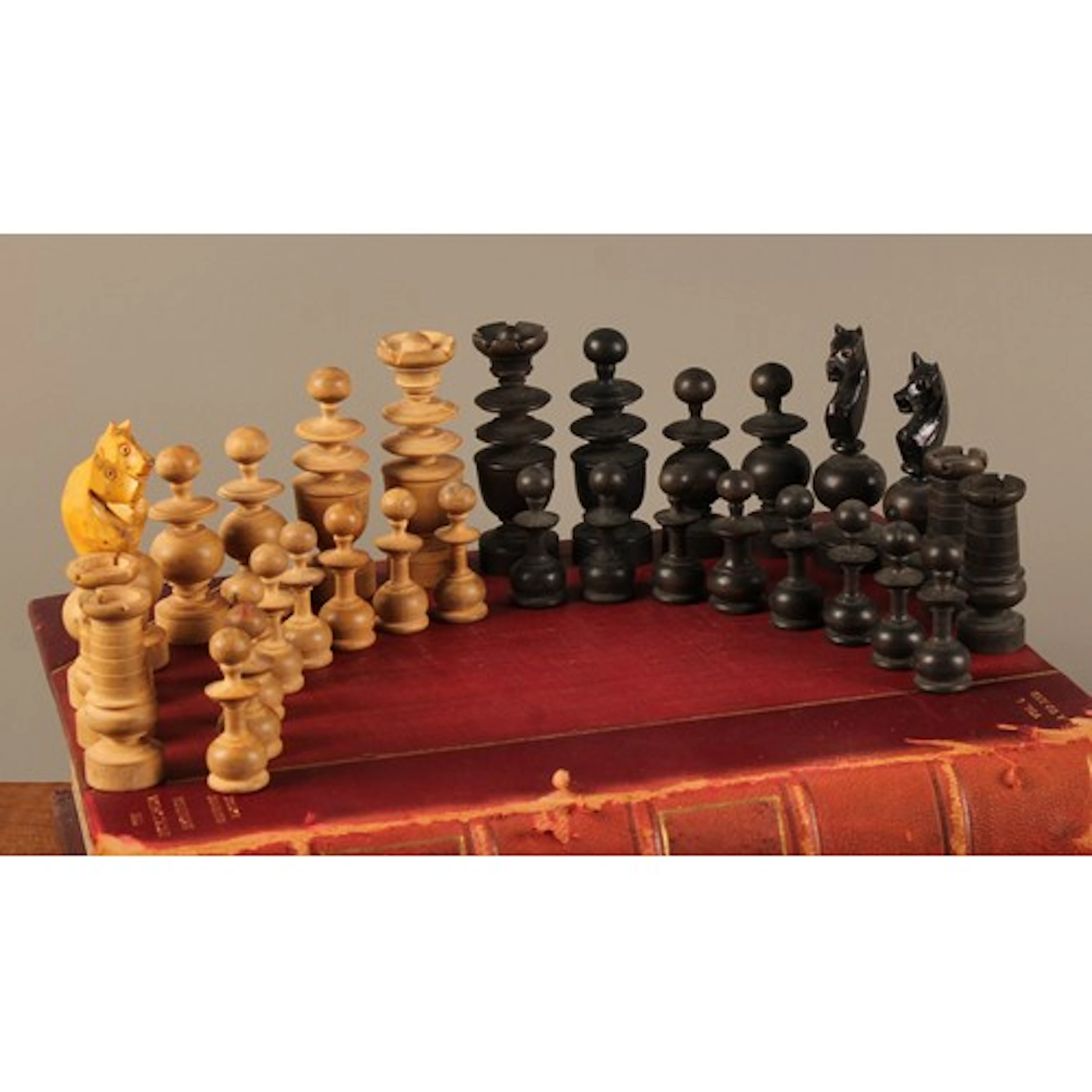 A boxwood and ebonised Calvert or St. George type chess set,...