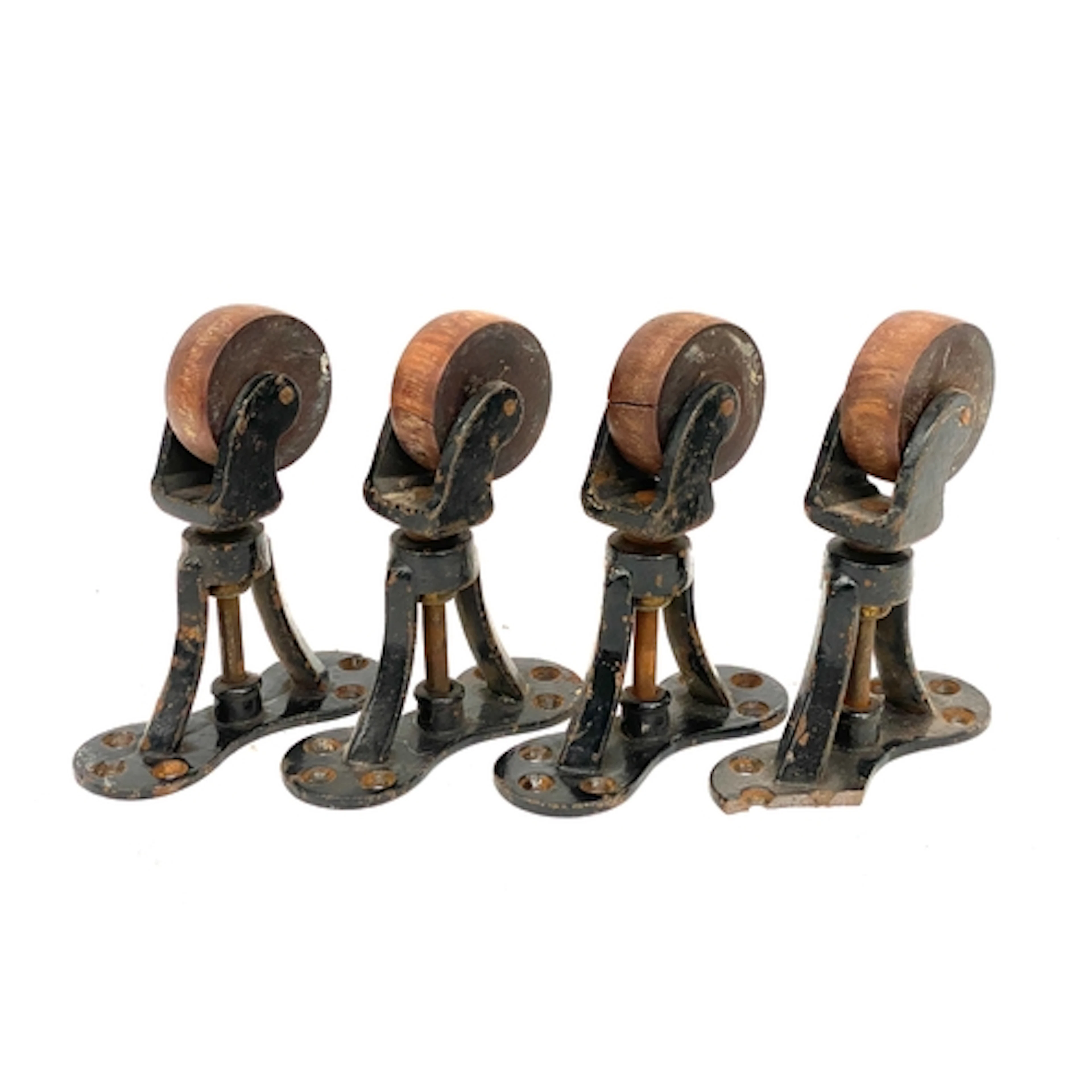 A set of four 19th century casters with mahogany wheels, sta...