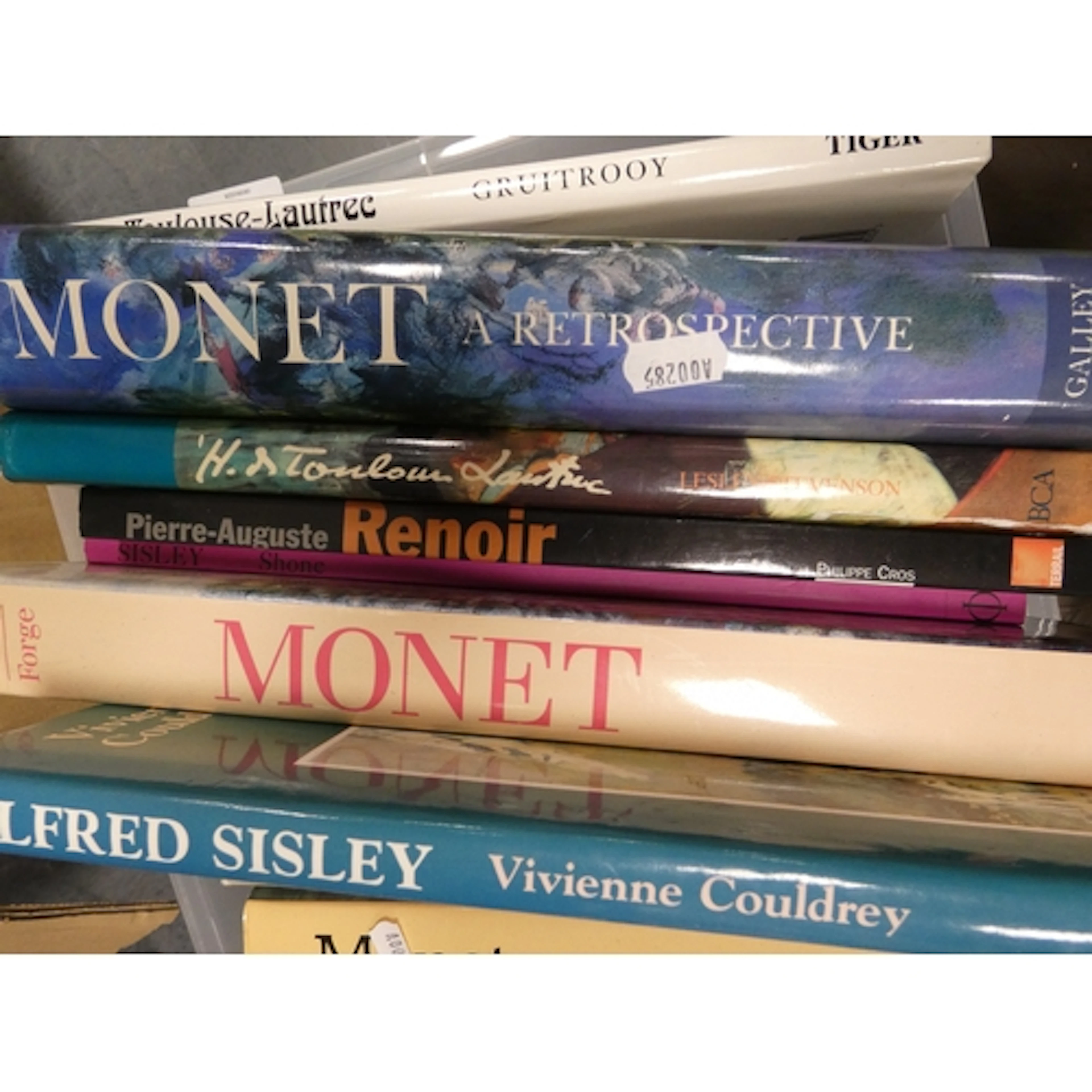 Box of art related books to include Cezanne, Monet etc.