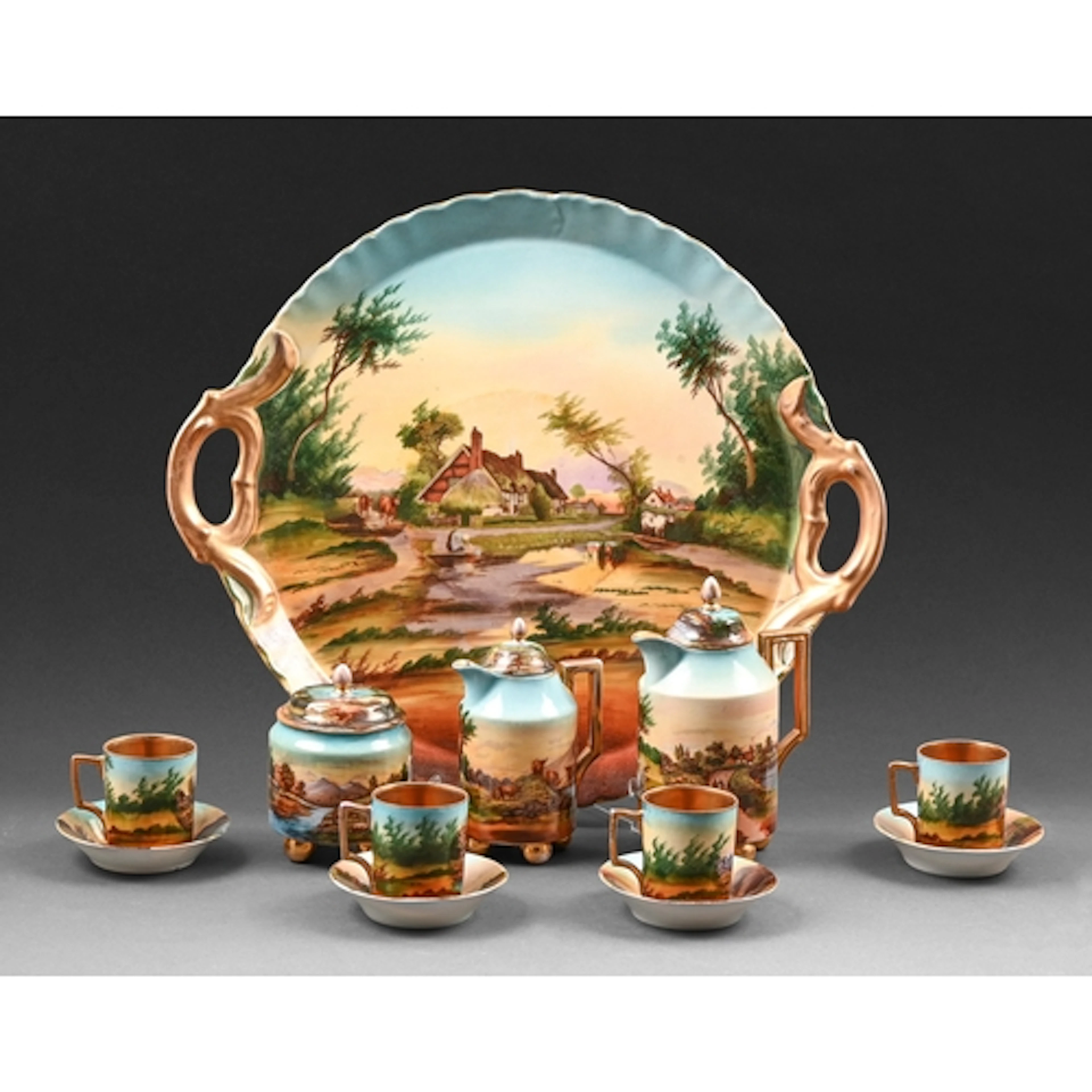 A Victoria Austrian porcelain cabaret service, early 20th c,...