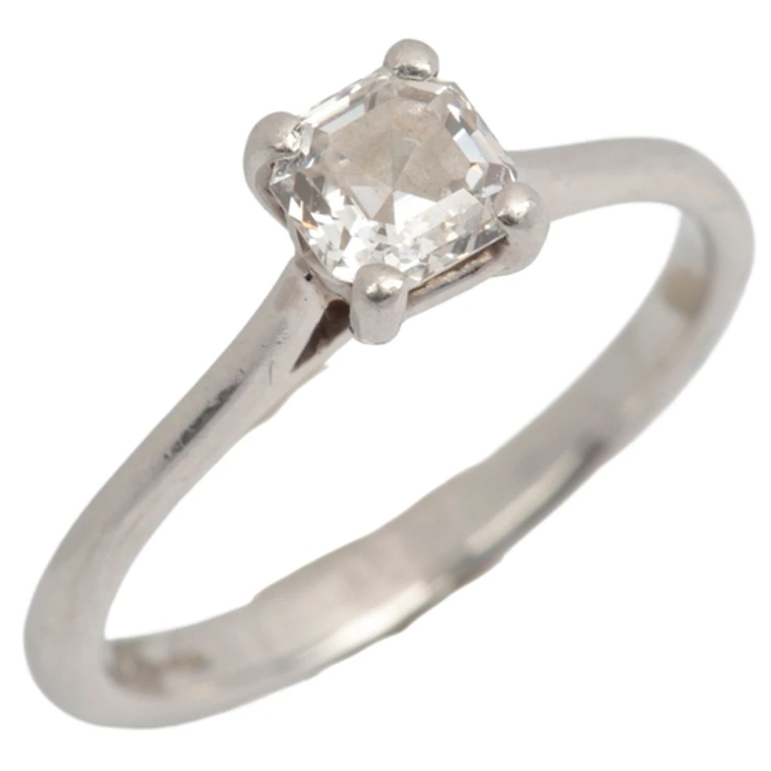 A diamond ring, claw-set with an Asscher-cut diamond weighin...