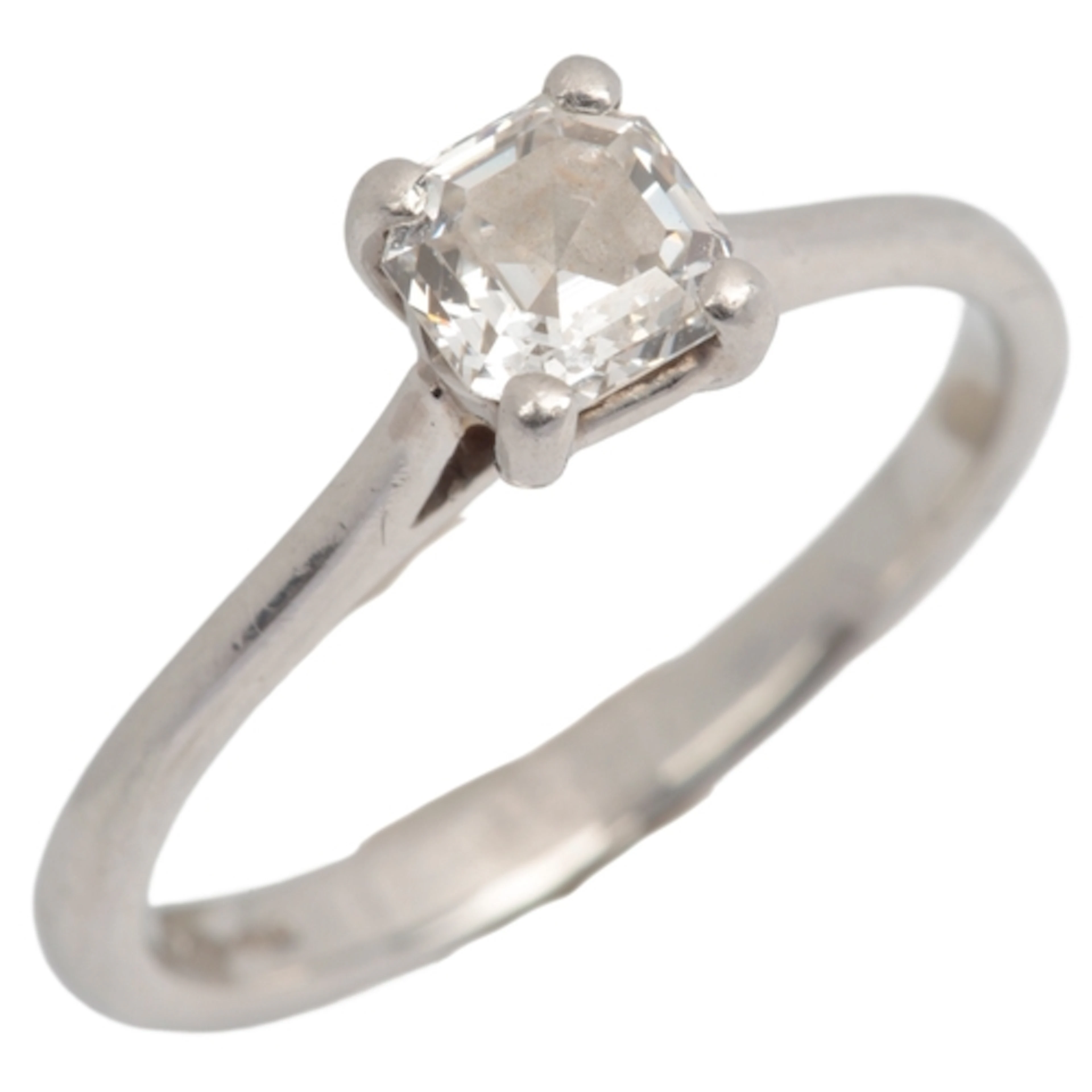 A diamond ring, claw-set with an Asscher-cut diamond weighin...