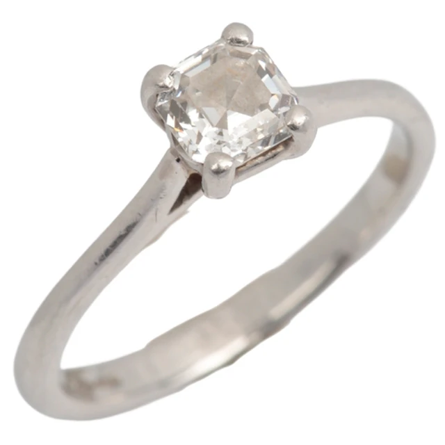 A diamond ring, claw-set with an Asscher-cut diamond weighin...