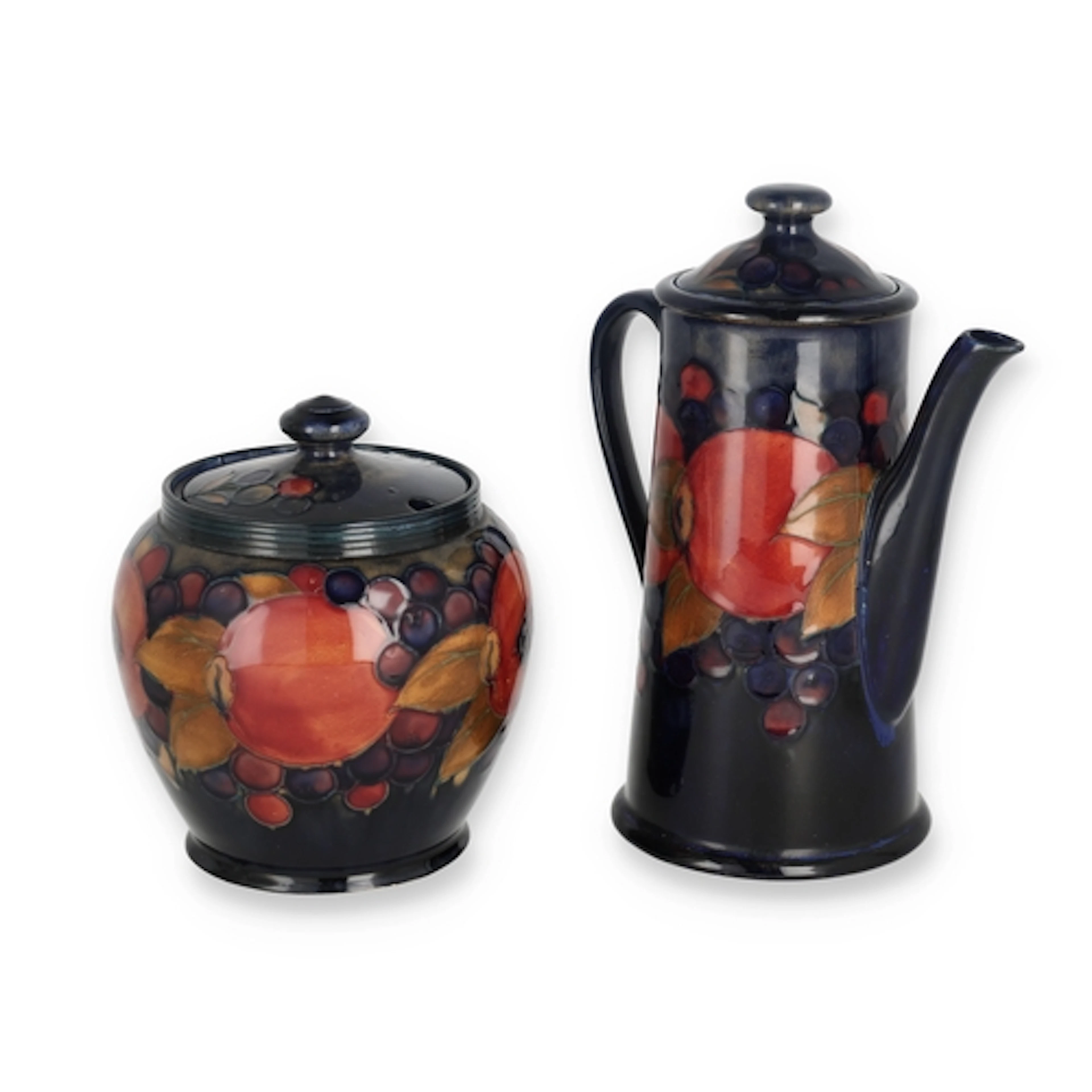 A MOORCROFT POMEGRANATE COFFEE POT AND SUGAR BOWL ...